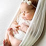 Rimantė is registered to the contest to win money with this photo: baby, newborn, sleeping, infant, white, lace, headband, bow, fabric, hammock, soft, cute, peaceful, tiny, hands, feet, portrait, closeup, indoors, skin
