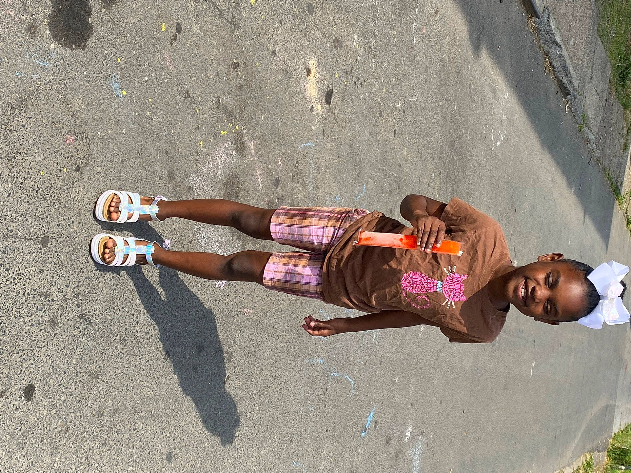 Journee is registered to the contest to win money with this photo: asphalt, calf, dress, foot, fun, happy, human_body, human_leg, joy, knee, leg, leisure, people_in_nature, person, recreation, road, road_surface, sandal, shadow, shoe