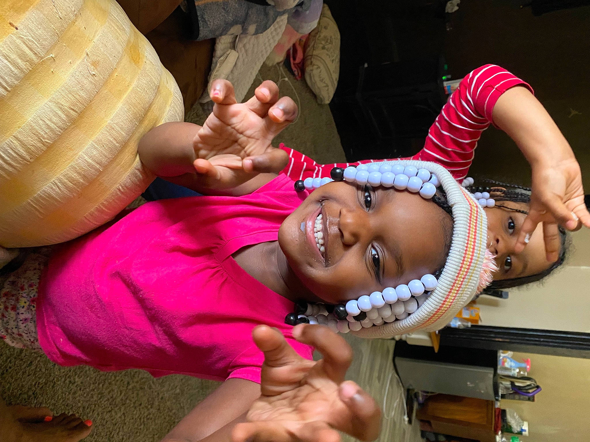 Chyrelle is registered to the contest to win money with this photo: black_hair, child, event, finger, fun, gesture, hand, happy, joy, leisure, mouth, muscle, nail, neck, person, pink, skin, smile, thigh, thumb