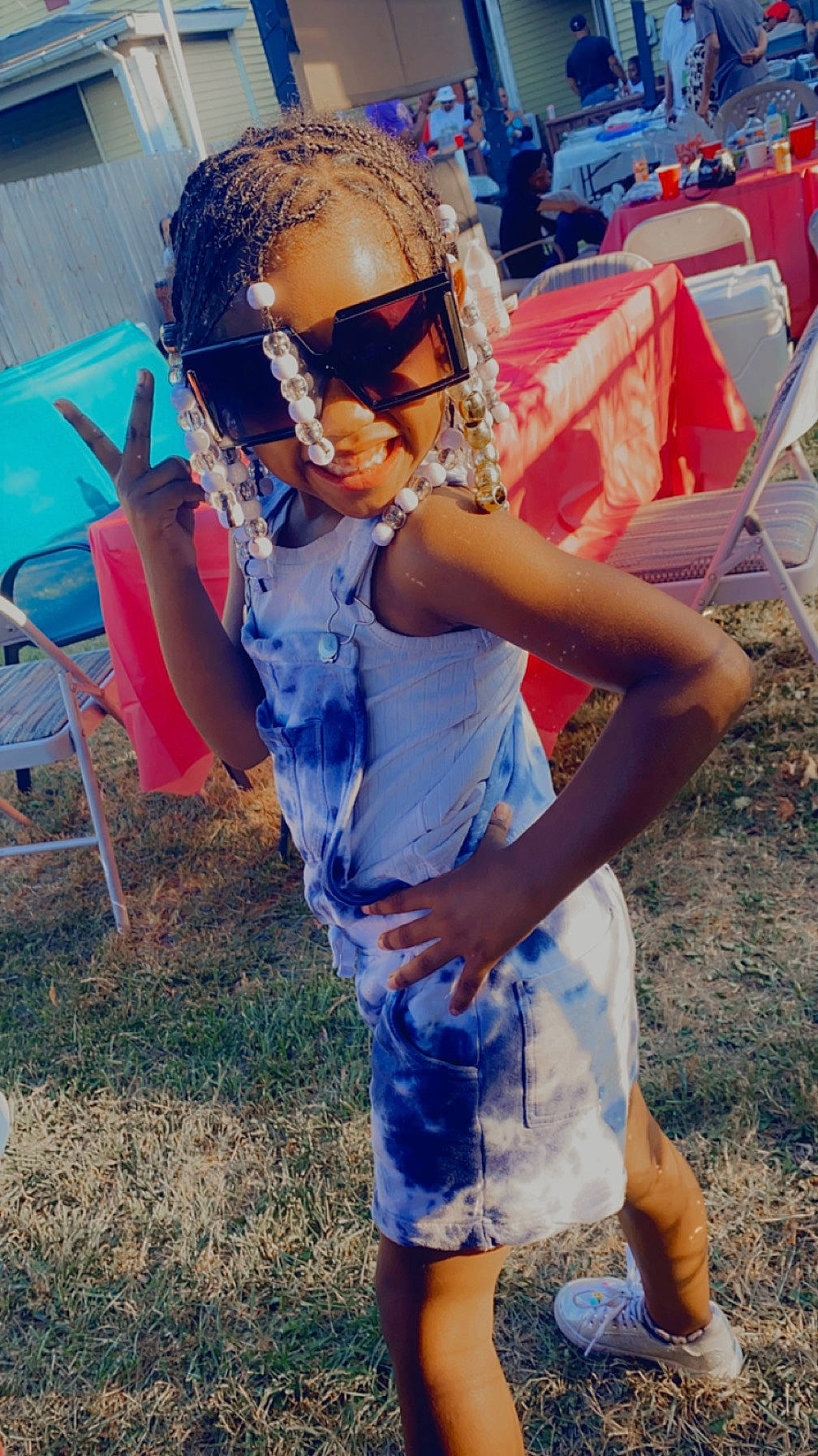 Khyasia joined the competition — help win amazing prizes! blue, child, electric_blue, event, eyewear, fun, glasses, goggles, grass, happy, human_leg, leisure, person, personal_protective_equipment, recreation, sports_gear, summer, sunglasses, toddler, vision_care