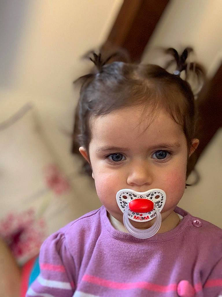 Arizona participe au concours pour gagner de l'argent avec cette photo : baby, cheek, child, eating, face, fun, head, lip, mouth, nose, person, smile, toddler