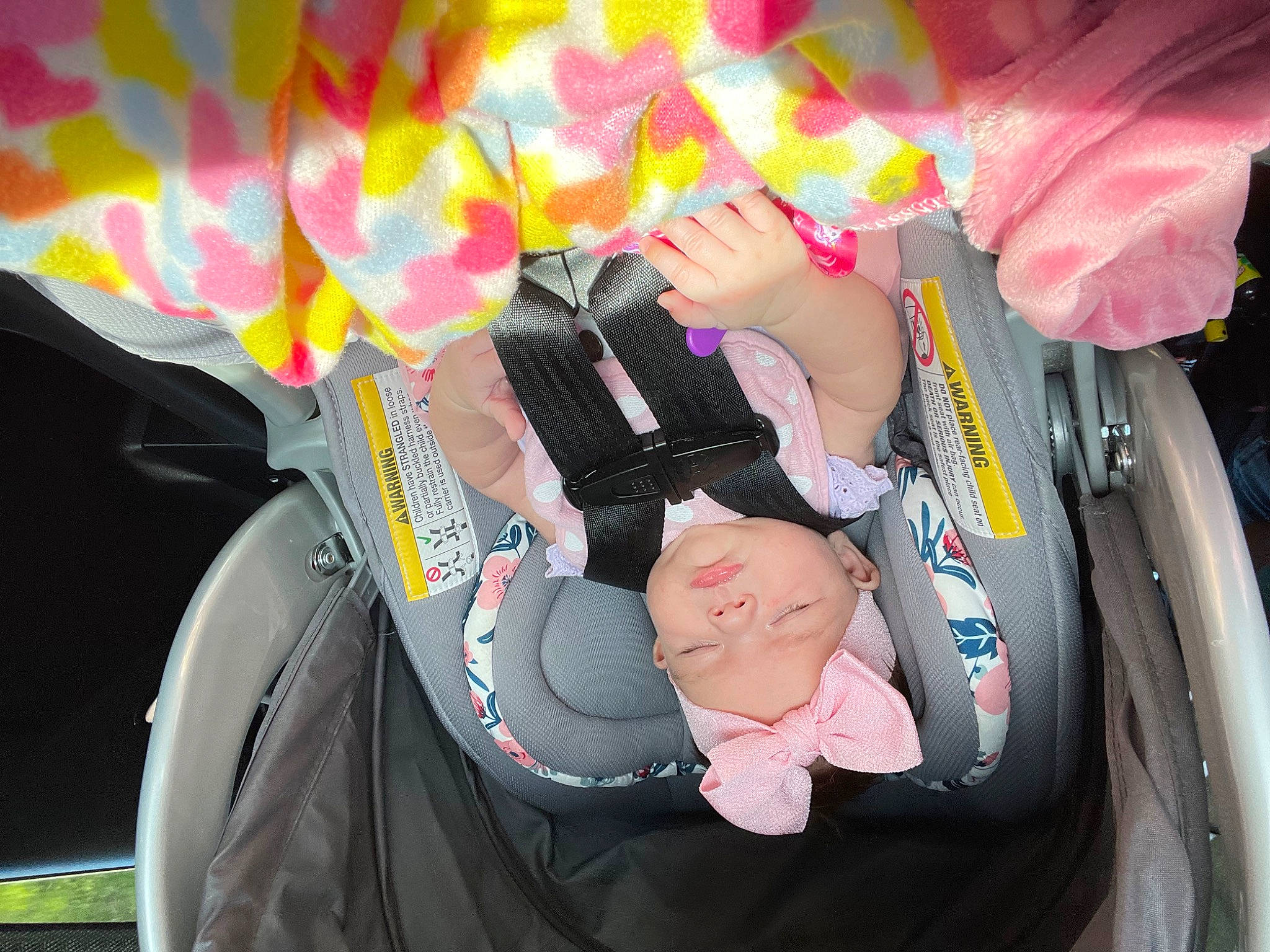 Kinsleigh is registered to the contest to win money with this photo: auto_part, baby, baby_carriage, baby_products, beauty, car_seat, child, event, fashion_accessory, fun, gesture, happy, headgear, headwear, magenta, nail, person, personal_protective_equipment, pink, toddler