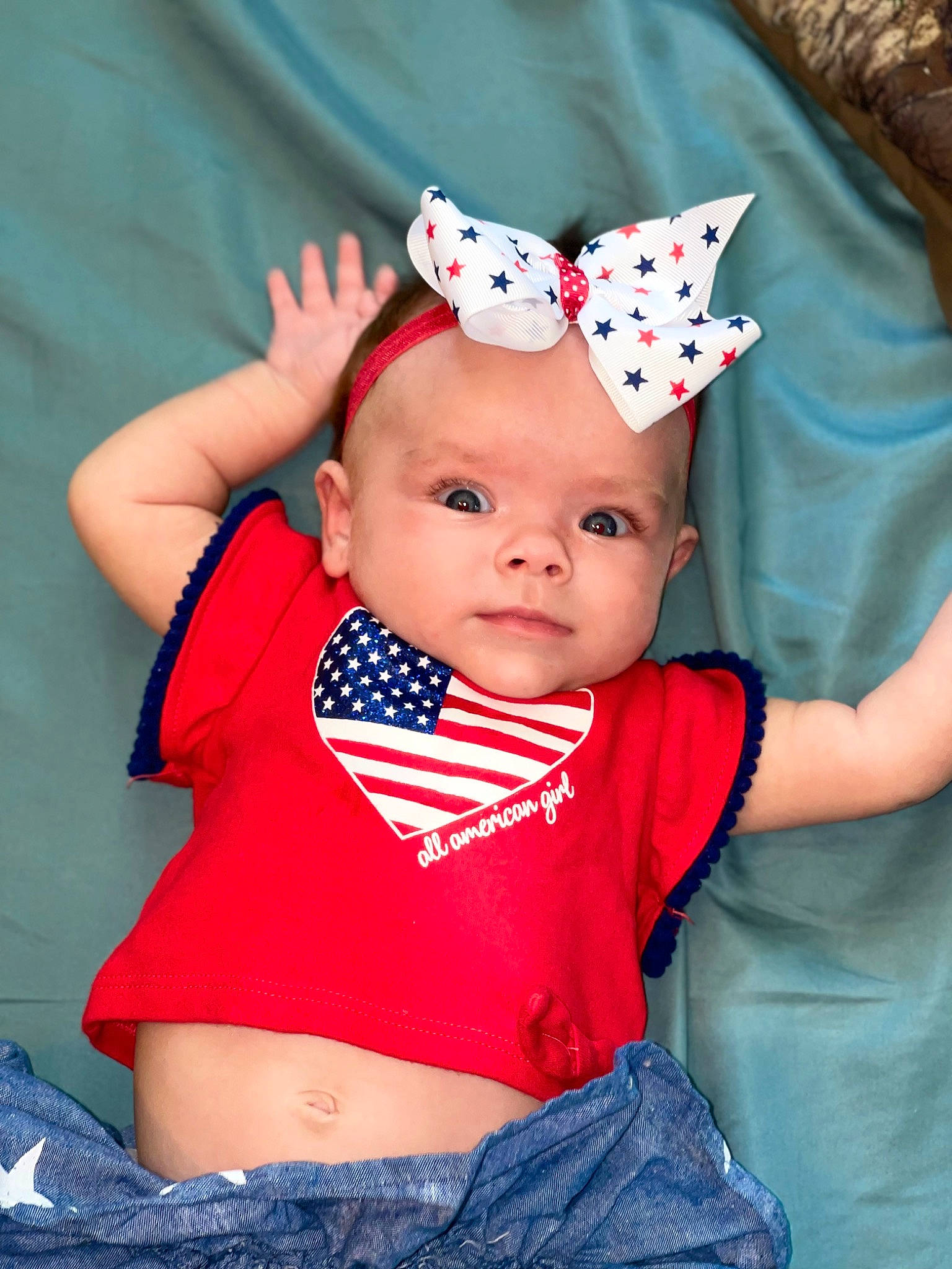 Kinsleigh is registered to the contest to win money with this photo: baby, baby_products, baby_toddler_clothing, blue, cap, cheek, child, chin, costume_hat, face, happy, head, headgear, headwear, human_body, person, pink, red, sleeve, textile