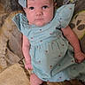 Alayna joined the competition — help win amazing prizes! baby, blanket, blue_dress, bow, child, clothing, comfort, cute, expression, face, headband, indoors, infant, pattern, person, portrait, sitting, skin, small, young