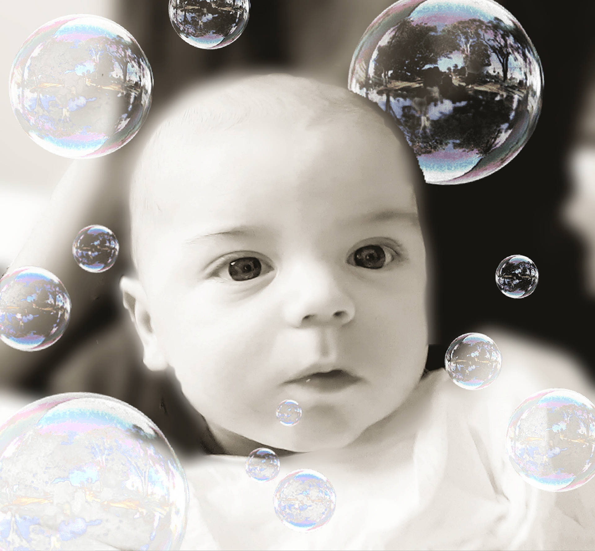 Calum is registered to the contest to win money with this photo: baby, black_and_white, child, face, glass, head, liquid_bubble, person, photography, smile, space, sphere, toddler, water, world