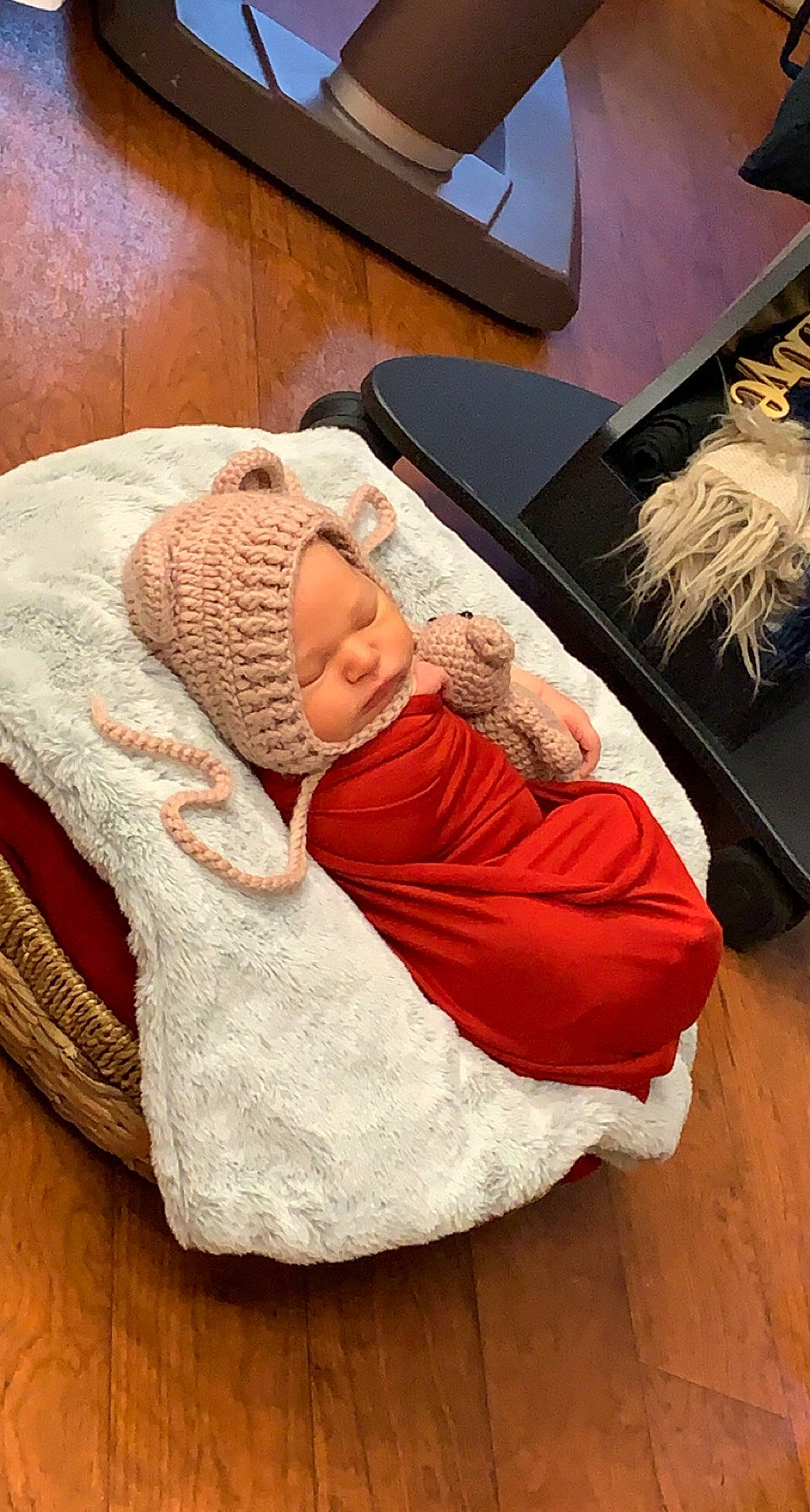 Jamie is registered to the contest to win money with this photo: baby, baby_products, baby_sleeping, bedtime, child, comfort, feather, flooring, fur, hardwood, headwear, laminate_flooring, linens, nap, person, room, sitting, textile, toddler, wood