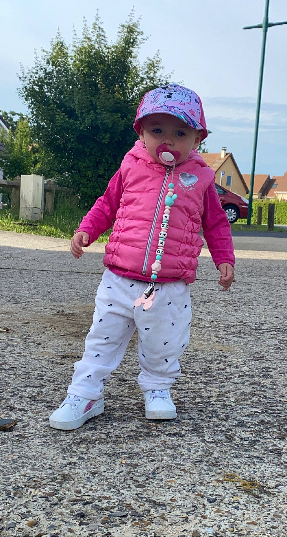 Oxana participe au concours pour gagner de l'argent avec cette photo : baby, baby_toddler_clothing, cap, eye, fashion_accessory, grass, happy, hat, headwear, leisure, magenta, pattern, person, pink, plant, recreation, sky, sleeve, smile, sun_hat