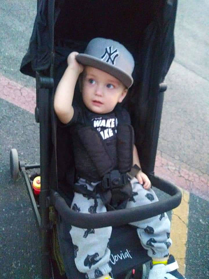 Prince joined the competition — help win amazing prizes! auto_part, baby, baby_carriage, baby_products, baby_toddler_clothing, black, child, electric_blue, face, fashion_accessory, grass, hat, head, headgear, headwear, person, personal_protective_equipment, recreation, sun_hat, tire