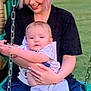Noah joined the competition — help win amazing prizes! baby, woman, swing, outdoor, grass, holding, smiling, child, person, playground, happy, casual_clothing, daylight, nature, park, parent, fun, family, leisure, chain