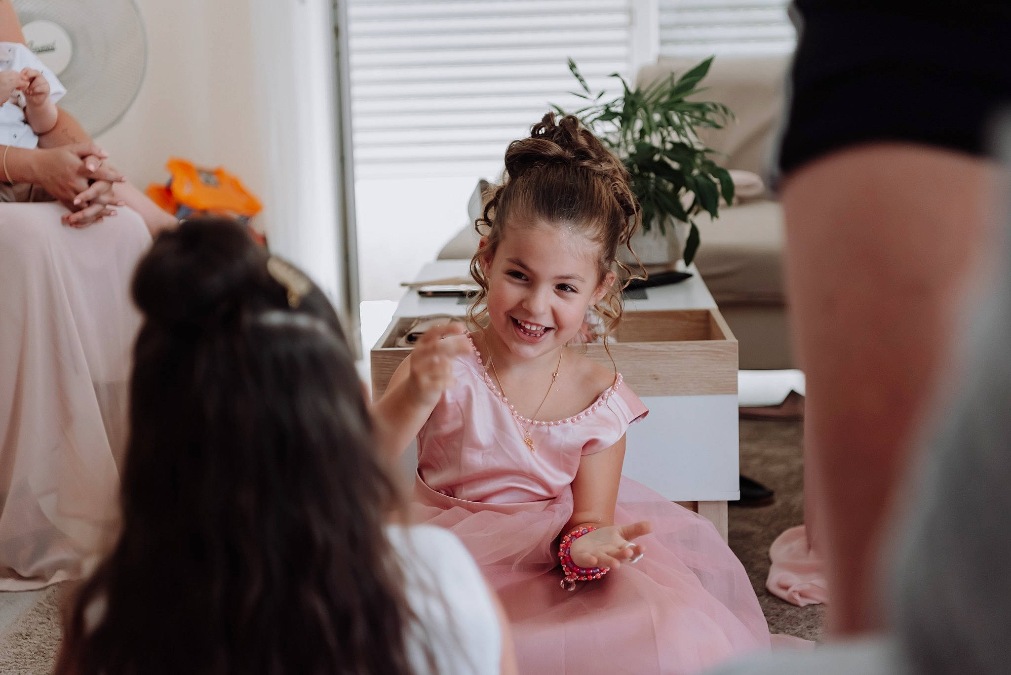 Lihanna participe au concours pour gagner de l'argent avec cette photo : bridal_accessory, bridal_clothing, bridal_party_dress, child, dress, event, flash_photography, formal_wear, fun, gesture, gown, happy, headpiece, jewellery, joy, marriage, person, plant, smile, toddler