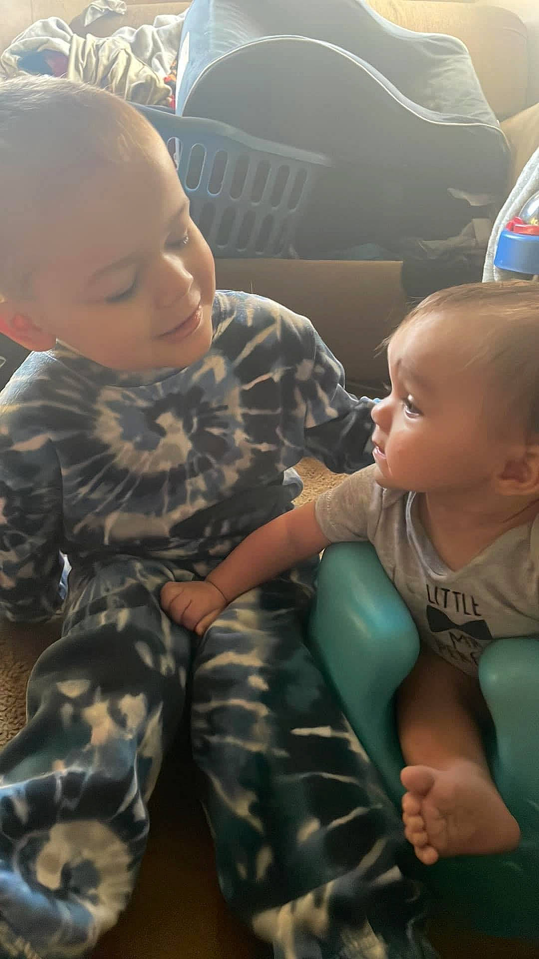 Donavin joined the competition — help win amazing prizes! baby, baby_toddler_clothing, cheek, face, finger, gesture, hairstyle, happy, head, interaction, iris, joint, military_camouflage, mouth, nose, person, skin, smile, standing, toddler