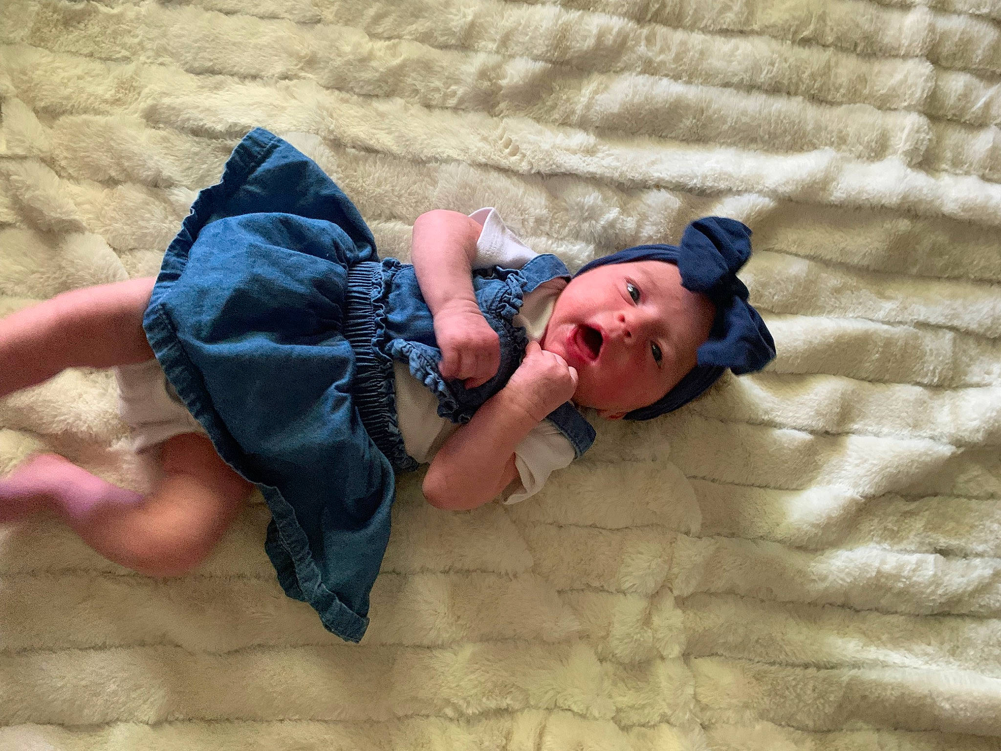 Novalynn joined the competition — help win amazing prizes! azure, baby, baby_toddler_clothing, child, comfort, electric_blue, finger, flooring, foot, fun, headwear, human_leg, leg, leisure, linens, pattern, person, sand, sitting, thigh