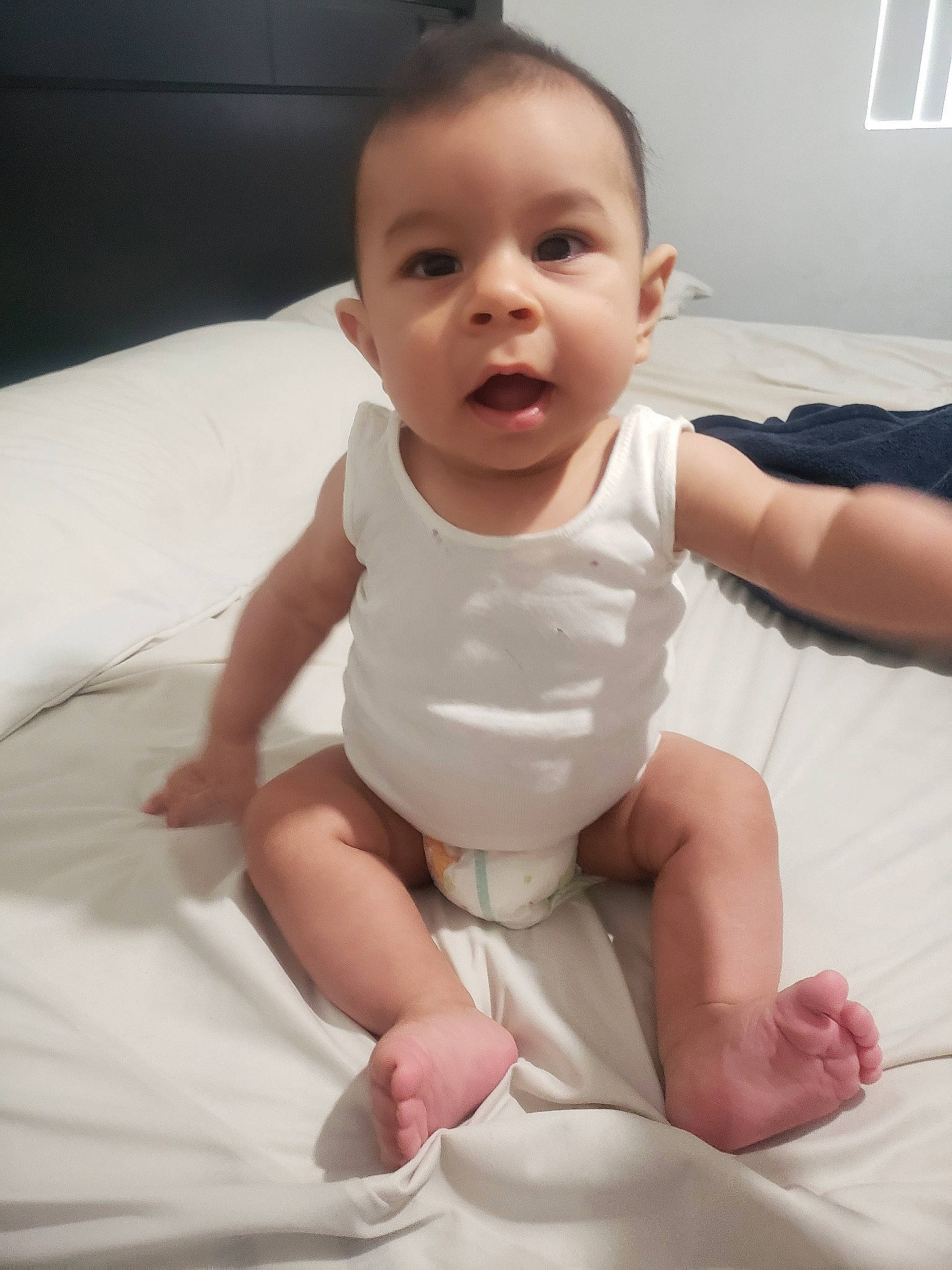 Gohan is registered to the contest to win money with this photo: arm, baby, baby_toddler_clothing, beauty, cheek, child, face, facial_expression, finger, hand, head, leg, mouth, nose, person, product, sitting, skin, smile, toddler