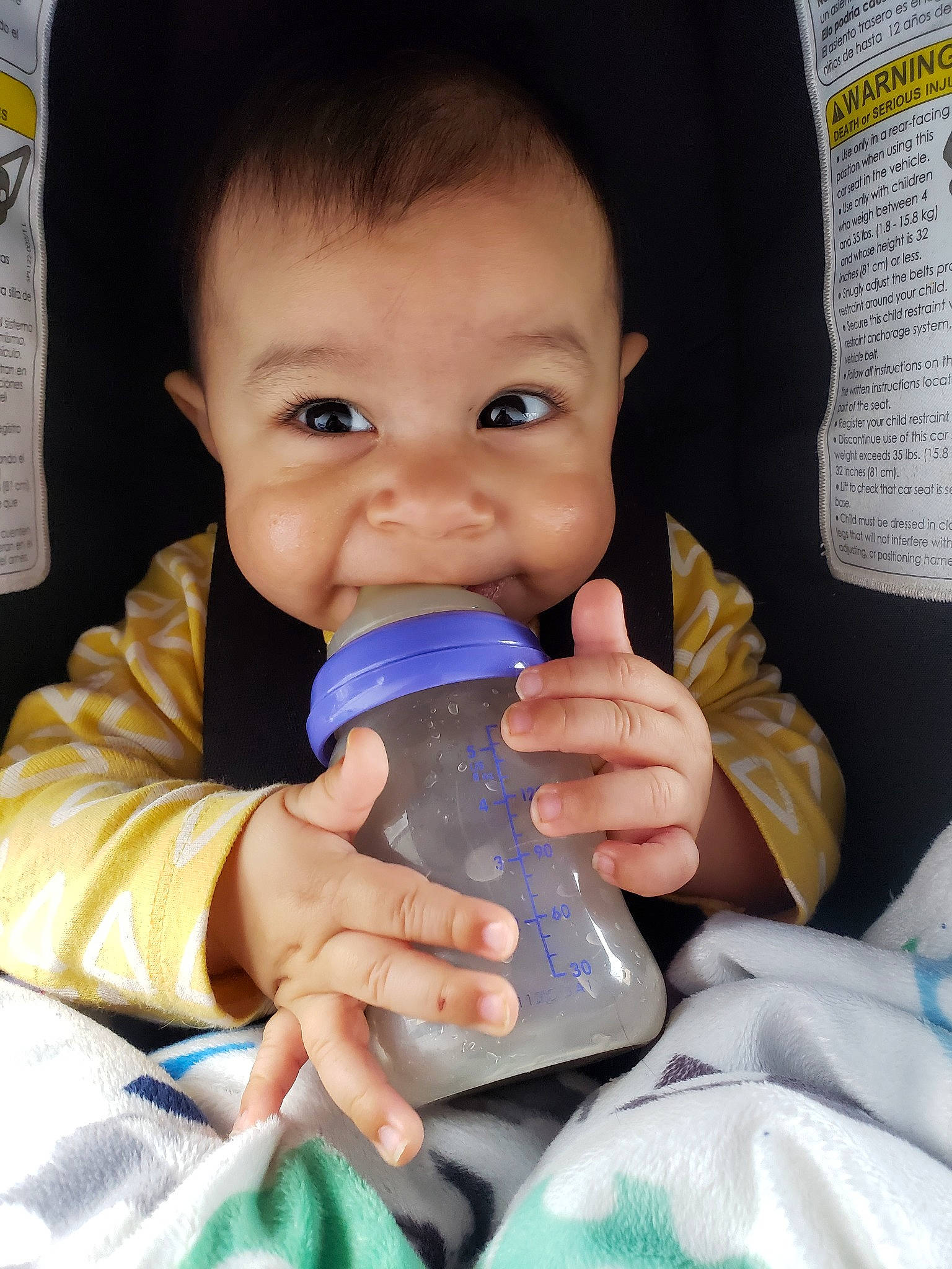 Gohan is registered to the contest to win money with this photo: baby, baby_bottle, baby_products, bottle, cheek, child, drink, drinking, drinkware, mouth, person, plastic_bottle, product, skin, tableware, toddler