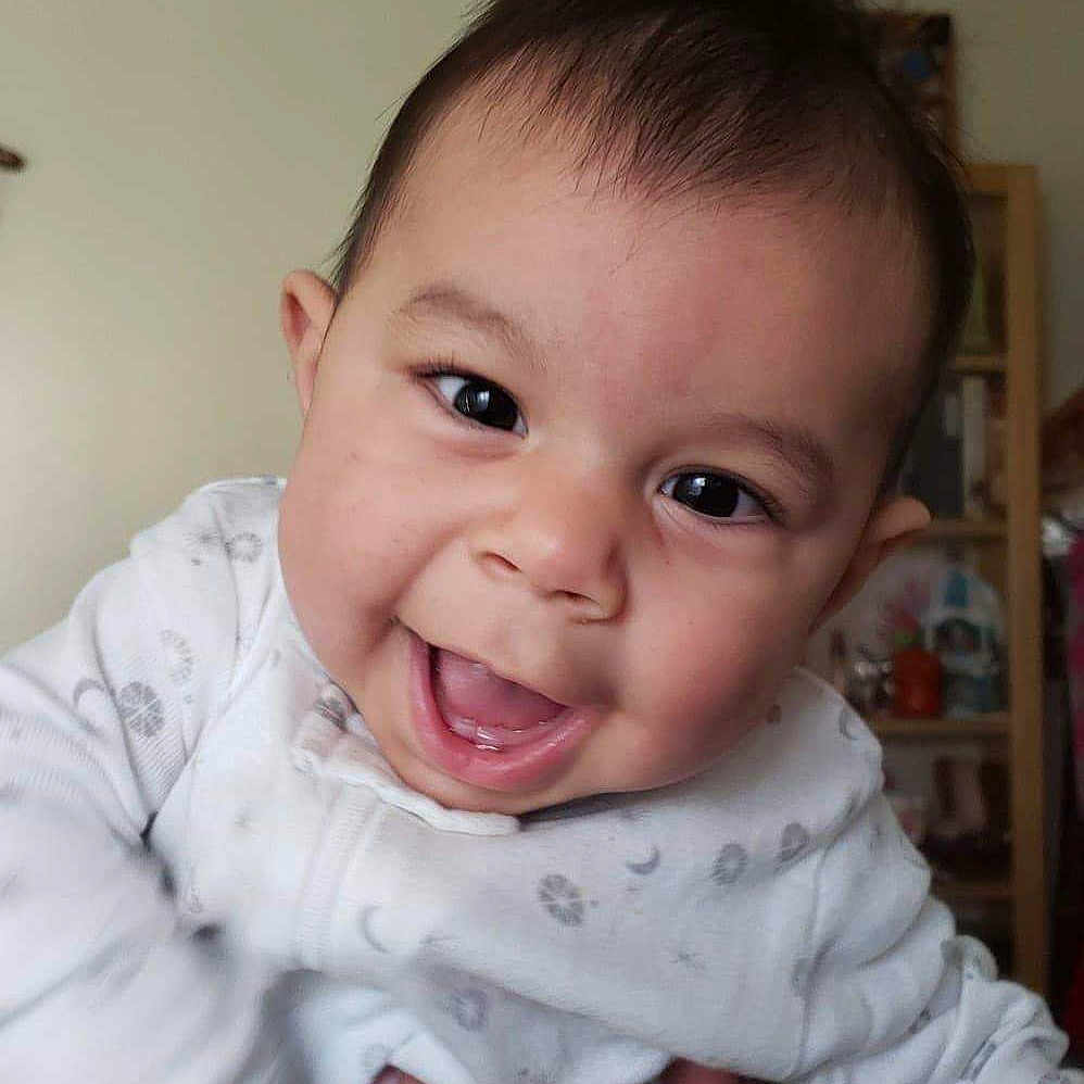 Gohan is registered to the contest to win money with this photo: baby, baby_making_funny_faces, cheek, child, chin, ear, eye, eyebrow, face, facial_expression, finger, forehead, head, laugh, lip, mouth, nose, person, skin, smile