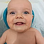 baby, bath, bathtub, blue_eyes, child, cute, face, happy, infant, inside, joyful, looking_up, naked, portrait, seat, smiling, skin, water, wet, young