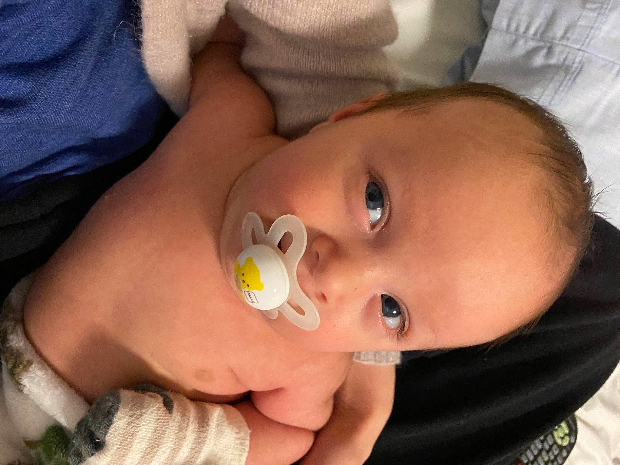 Lennon joined the competition — help win amazing prizes! baby, baby_toddler_clothing, cheek, ear, eye, eyebrow, eyelash, face, facial_expression, gesture, hand, head, iris, lip, mouth, neck, nose, person, product, skin