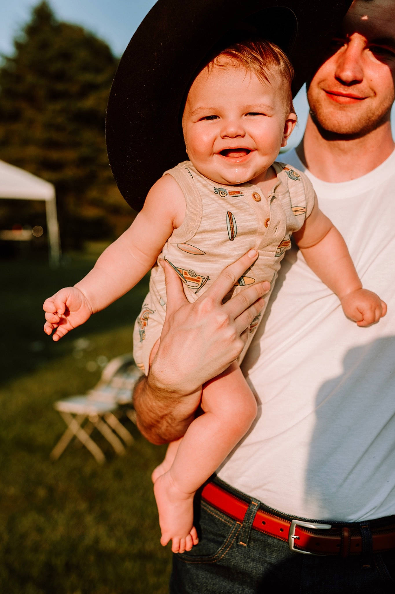 Trace joined the competition — help win amazing prizes! baby, cap, event, face, finger, flash_photography, fun, gesture, grass, hand, happy, hat, headgear, headwear, joy, people_in_nature, person, photograph, pink, smile