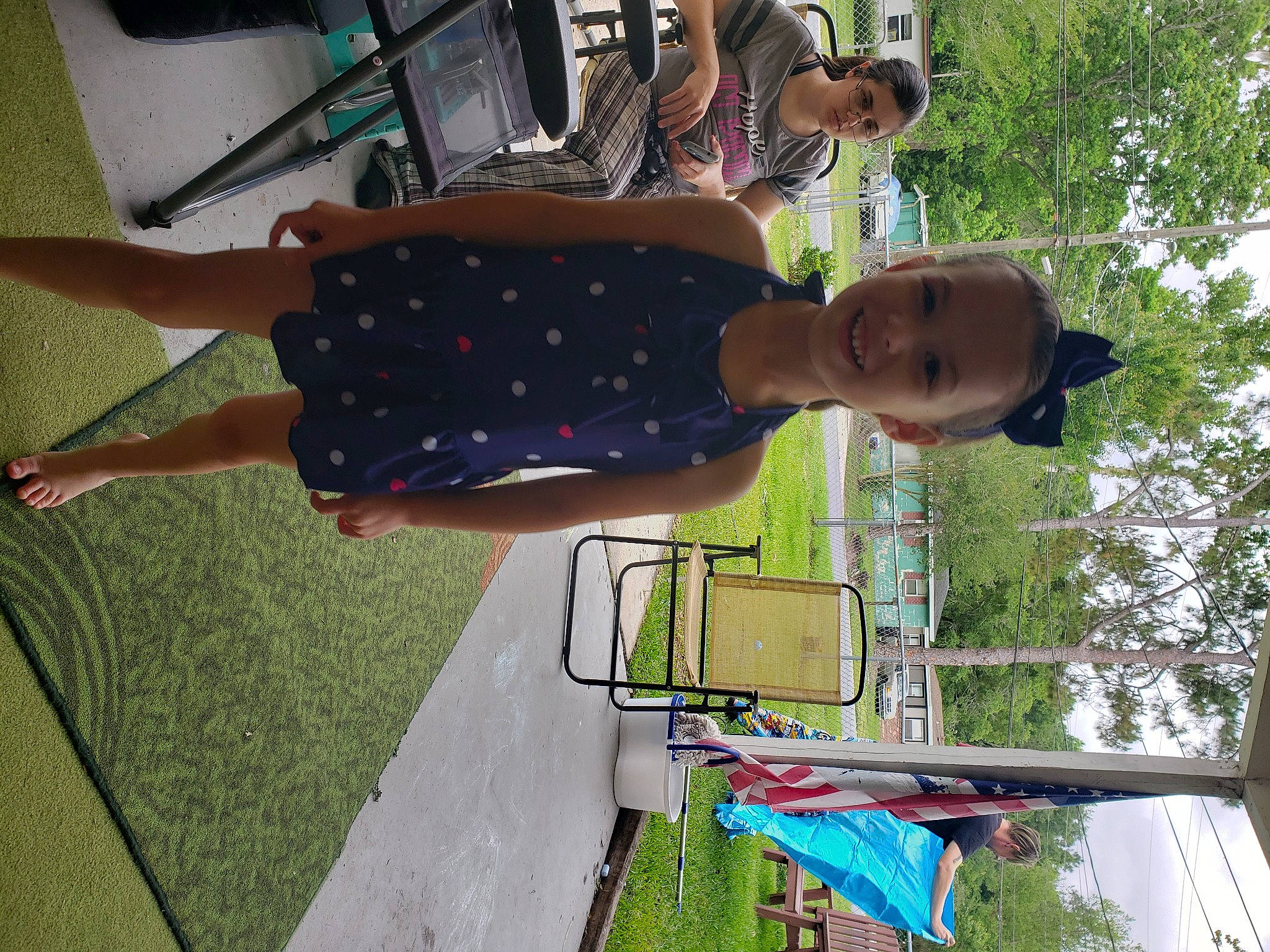 Aiyana is registered to the contest to win money with this photo: fun, grass, green, hat, human_leg, joy, leisure, pattern, person, plant, recreation, sky, smile, thigh, tree, vacation