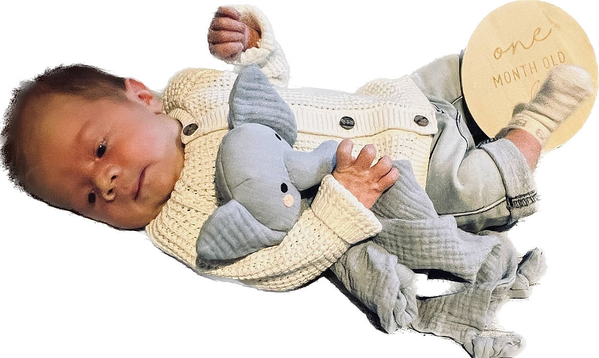 Coen is registered to the contest to win money with this photo: arm, baby, baby_toddler_clothing, child, comfort, finger, football, gesture, hand, happy, knee, leisure, mammal, people_in_nature, person, product, shoe, sitting, sneakers, toddler