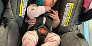 Lakelynn joined the competition — help win amazing prizes! baby, car_seat, child, comfort, cozy, cute, headband, indoor, infant, knitwear, newborn, pacifier, person, pink_clothing, resting, safety, seatbelt, small_hands, soft, toddler