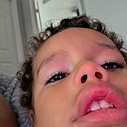 Donte joined the competition — help win amazing prizes! child, face, close_up, selfie, curly_hair, eyes, nose, lips, teeth, skin, indoors, expression, playful, portrait, person, young, cute, funny, casual, natural_light