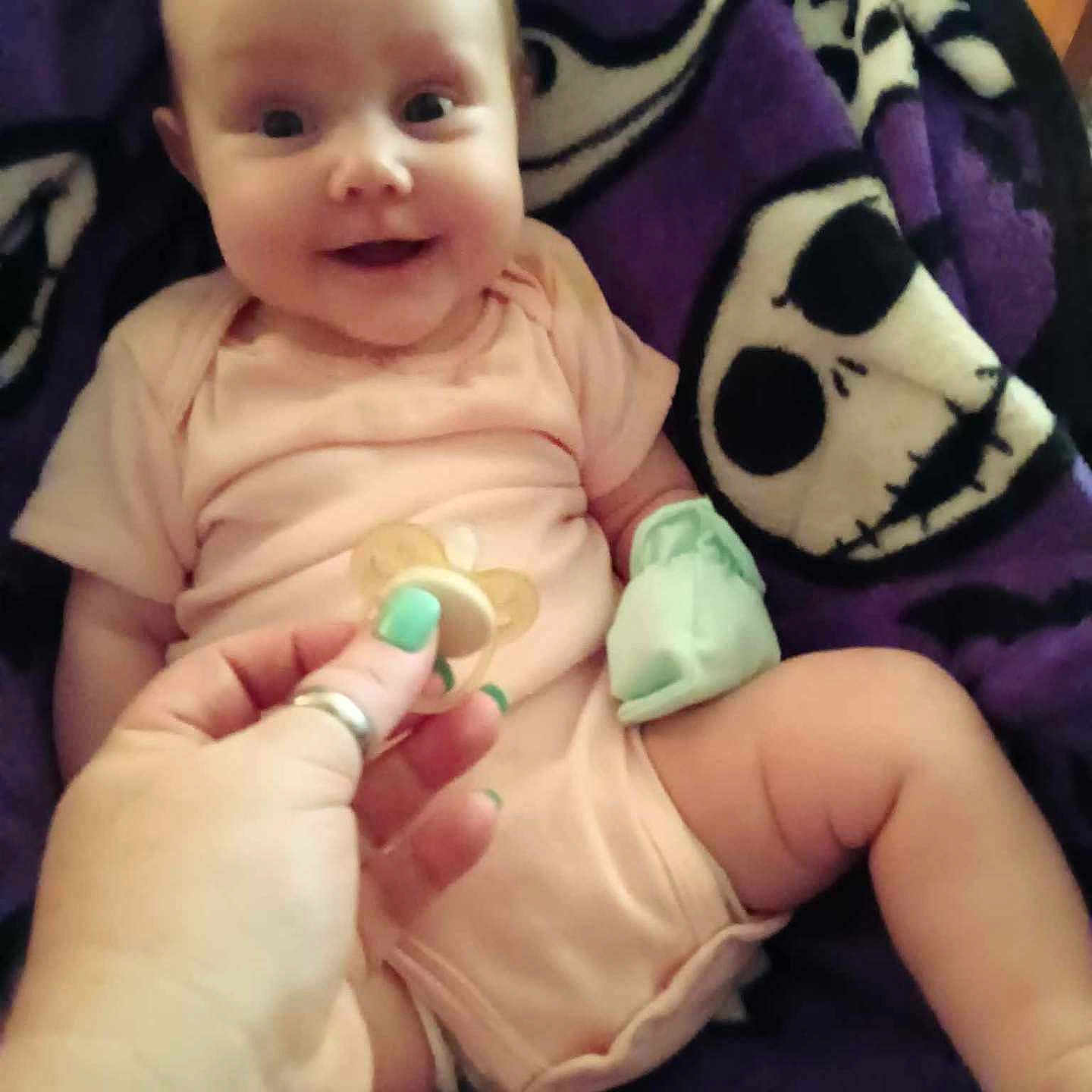 Adelyn is registered to the contest to win money with this photo: accessories, baby, bodypart, cushion, diaper, face, finger, furniture, hand, happy, head, homedecor, jewelry, medication, newborn, person, photography, pill, portrait, toy