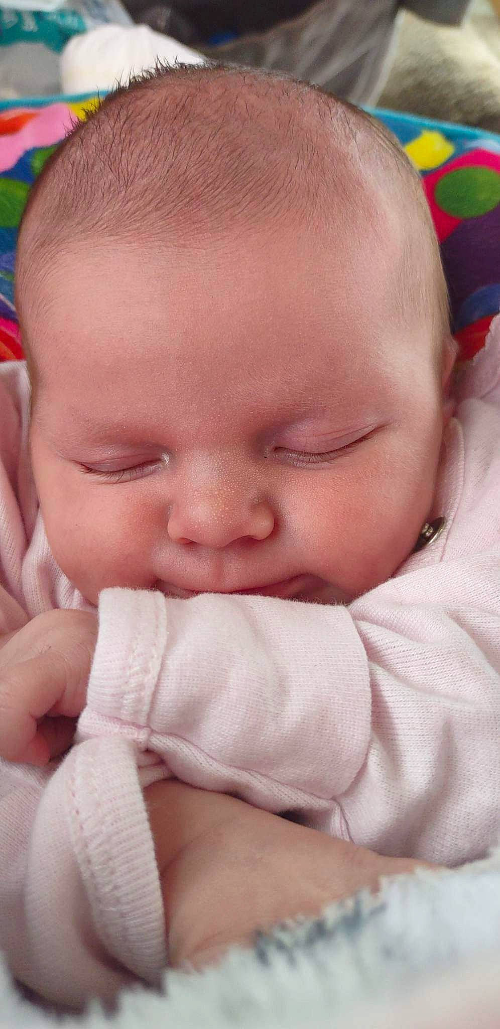 Baylee is registered to the contest to win money with this photo: baby, baby_sleeping, baby_toddler_clothing, cheek, chin, comfort, ear, eyebrow, eyelash, facial_expression, finger, forehead, gesture, iris, lip, mammal, mouth, nose, person, pink