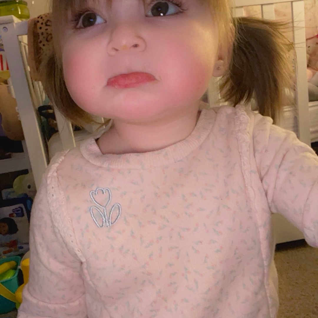 Aysel is registered to the contest to win money with this photo: baby, blouse, bodypart, clothing, face, finger, furniture, hair, head, indoors, knitwear, longsleeve, pants, person, photography, portrait, shirt, sleeve, sweater, t_shirt