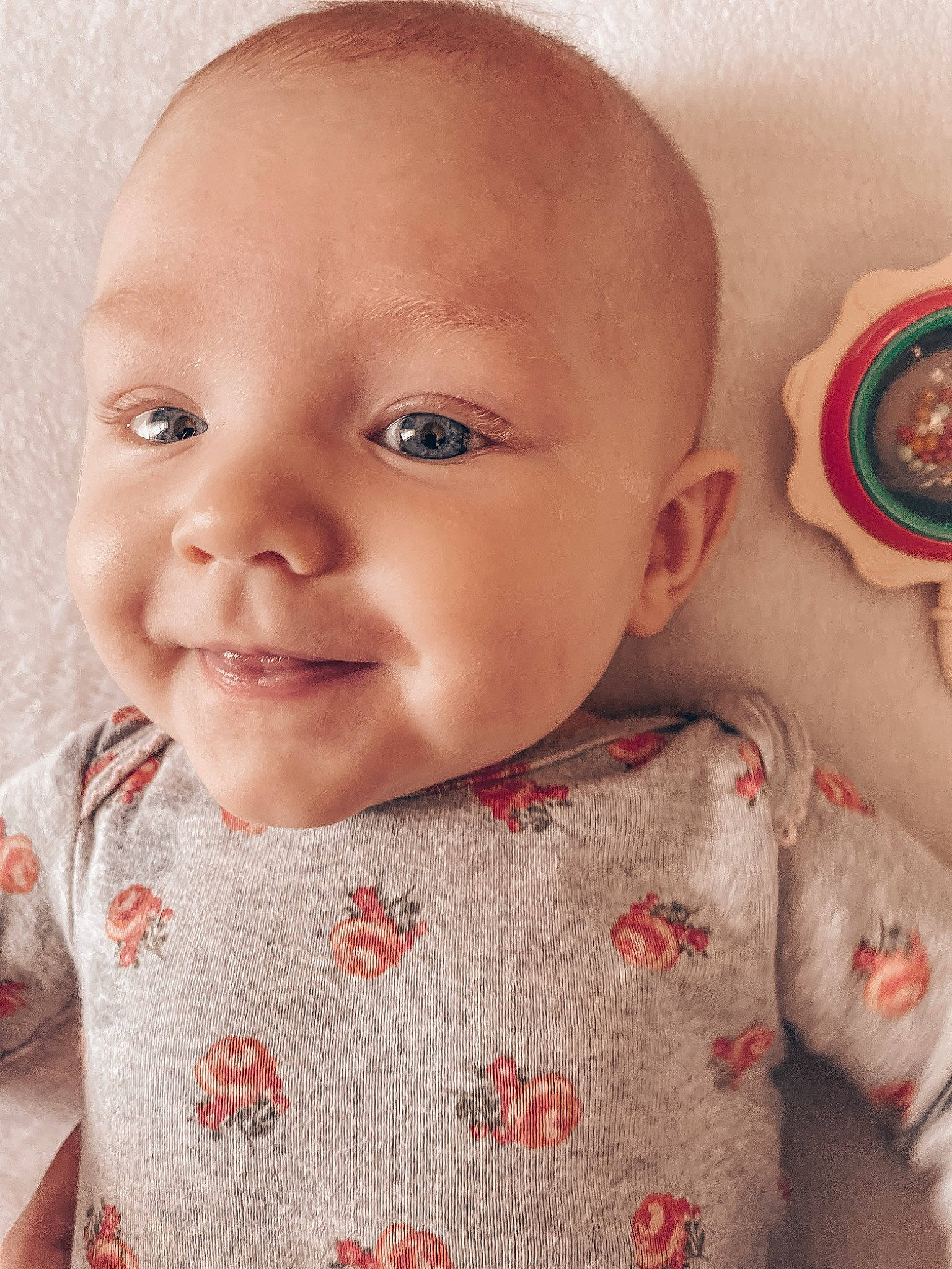 Charley is registered to the contest to win money with this photo: baby, baby_toddler_clothing, beauty, cheek, chin, eye, eyelash, happy, iris, lip, mouth, nose, organ, person, pink, red, skin, sleeve, smile, toddler