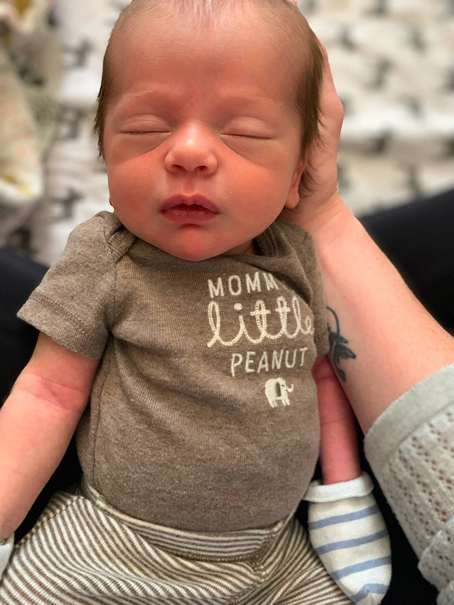 Elliot is registered to the contest to win money with this photo: baby, cheek, child, face, finger, head, nose, person, skin, smile, toddler