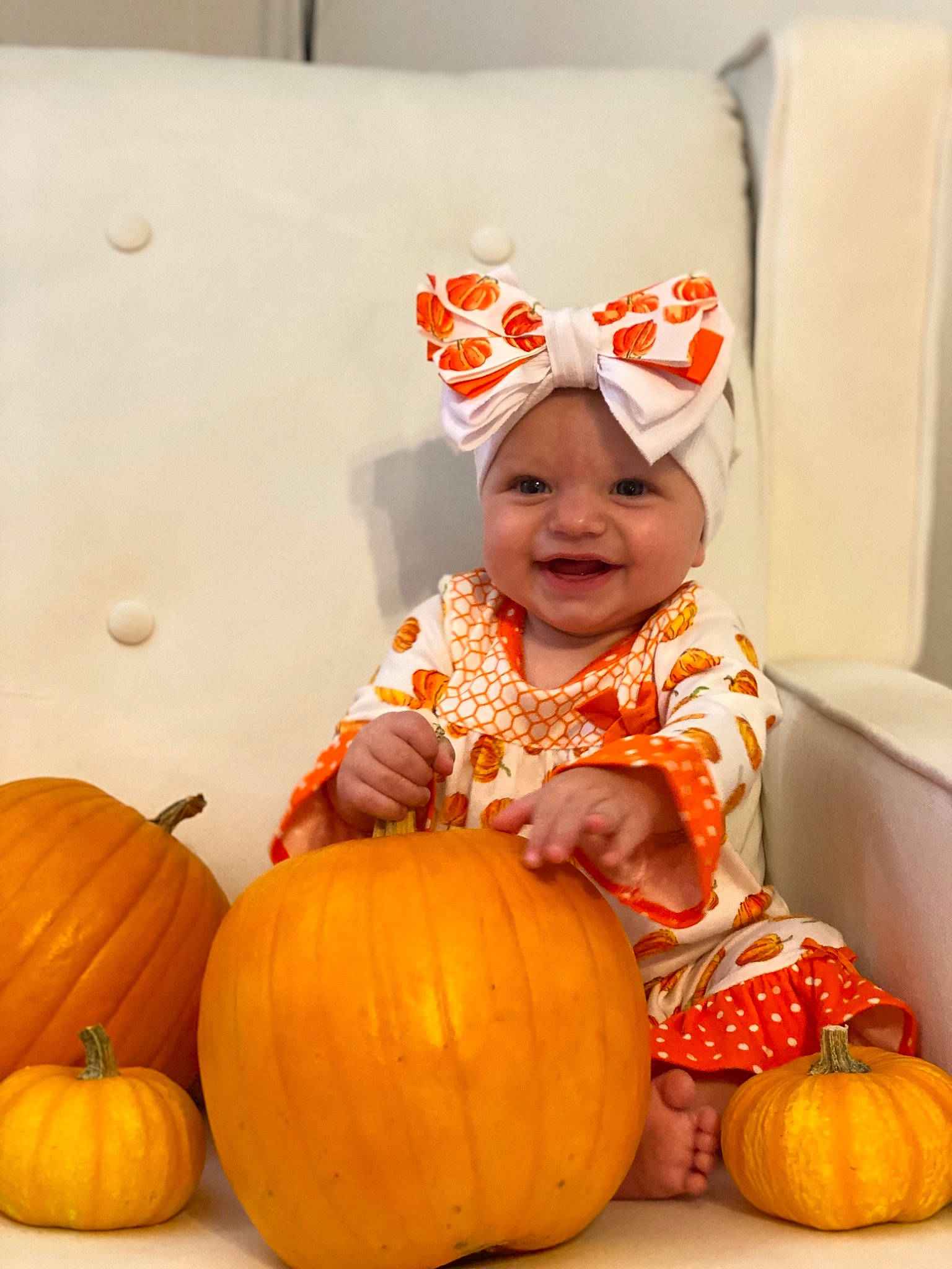 Emory joined the competition — help win amazing prizes! calabaza, eye, face, facial_expression, gourd, happy, head, headwear, joy, natural_foods, orange, person, photograph, plant, pumpkin, smile, squash, toddler, vegetable, white