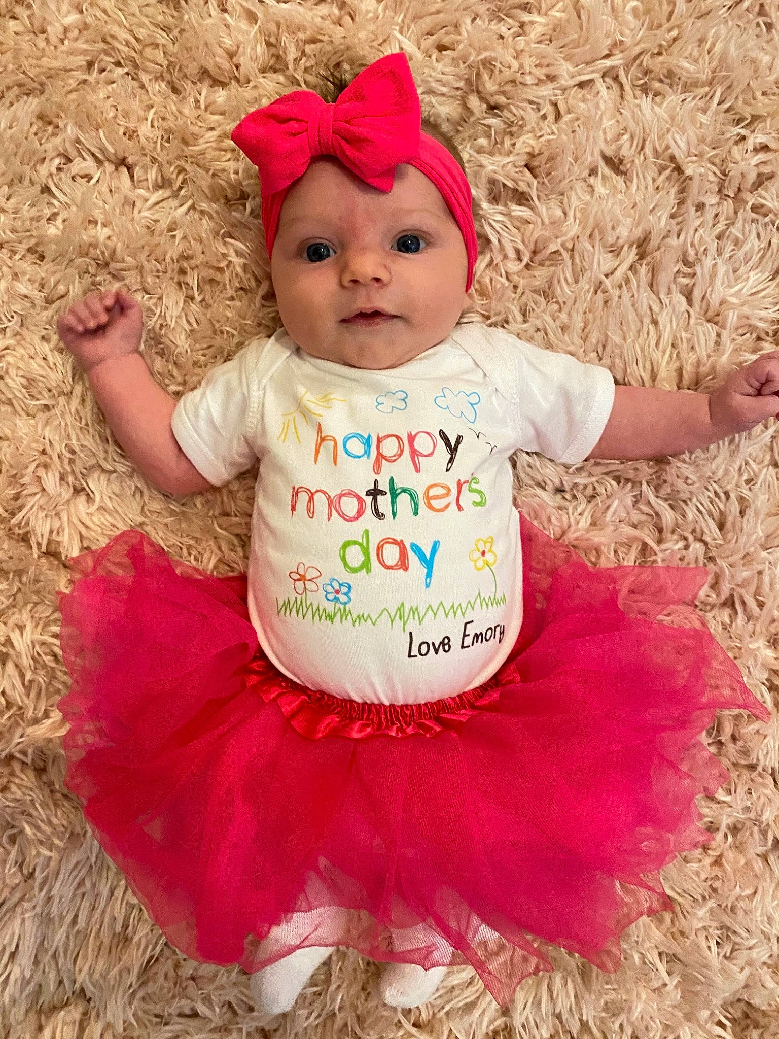 Emory joined the competition — help win amazing prizes! baby, baby_toddler_clothing, cap, child, clothing, costume_hat, dress, face, facial_expression, fun, grass, happy, hat, headgear, headwear, magenta, peach, person, pink, sleeve