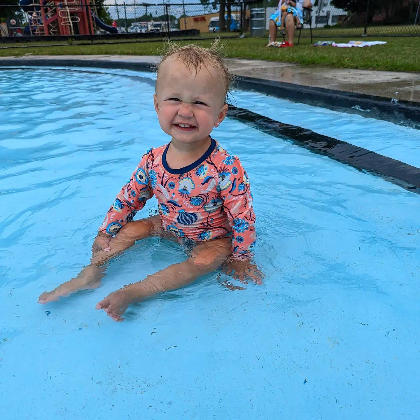 Gloria joined the competition — help win amazing prizes! baby, baby_toddler_clothing, barefoot, blue, child, composite_material, electric_blue, flooring, foot, fun, happy, joy, leisure, person, plant, recreation, sitting, smile, swimming_pool, toddler