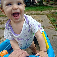 Emmalynn joined the competition — help win amazing prizes! baby, child, smiling, toy, walker, outdoor, hand, grass, concrete, tree, greenery, play, happy, person, clothing, headband, cute, young, support, nature