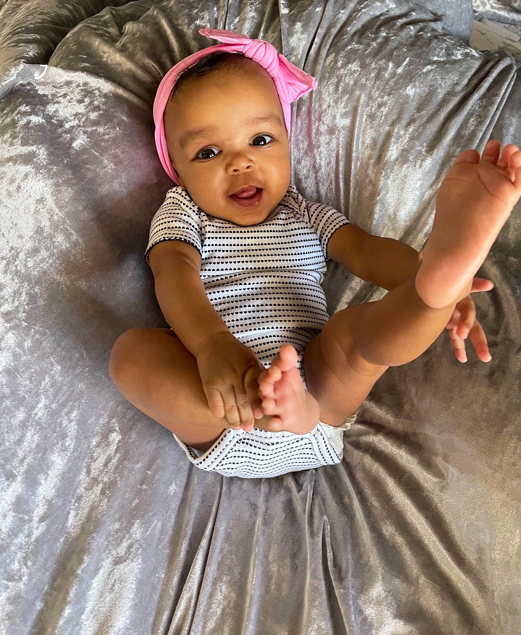 Khapri joined the competition — help win amazing prizes! baby, baby_toddler_clothing, child, child_model, costume_accessory, couch, day_dress, hair_accessory, headband, linens, mouth, person, skin, toddler