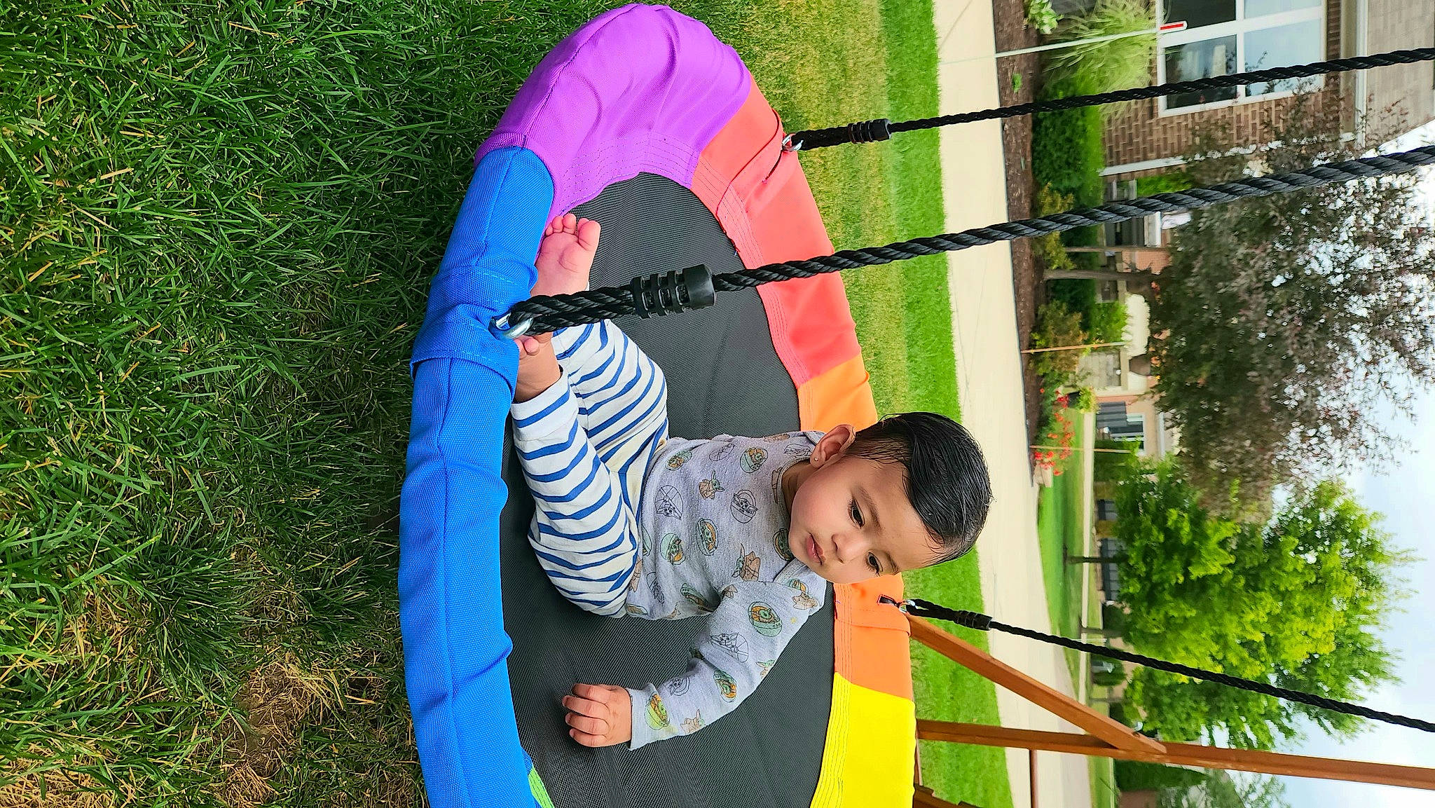 Dhiya is registered to the contest to win money with this photo: child, electric_blue, fun, grass, human_settlement, leaf, leisure, nature, outdoor_play_equipment, outdoor_recreation, people_in_nature, person, plant, public_space, recreation, shade, t_shirt, tints_and_shades, toddler, tree