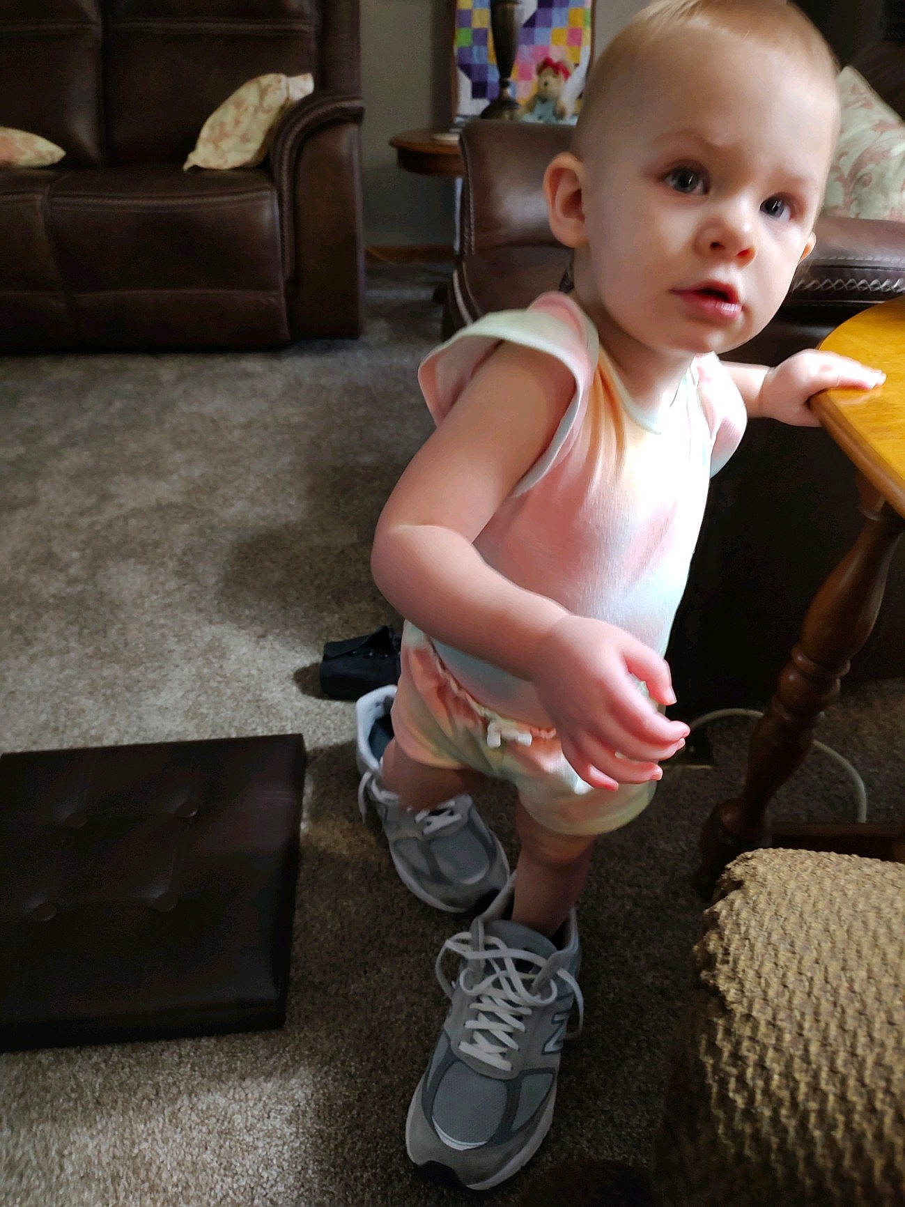 Gemma is registered to the contest to win money with this photo: baby, baby_toddler_clothing, cheek, child, comfort, eye, floor, flooring, head, human_leg, joint, knee, lap, leg, person, shorts, sock, standing, thigh, toddler