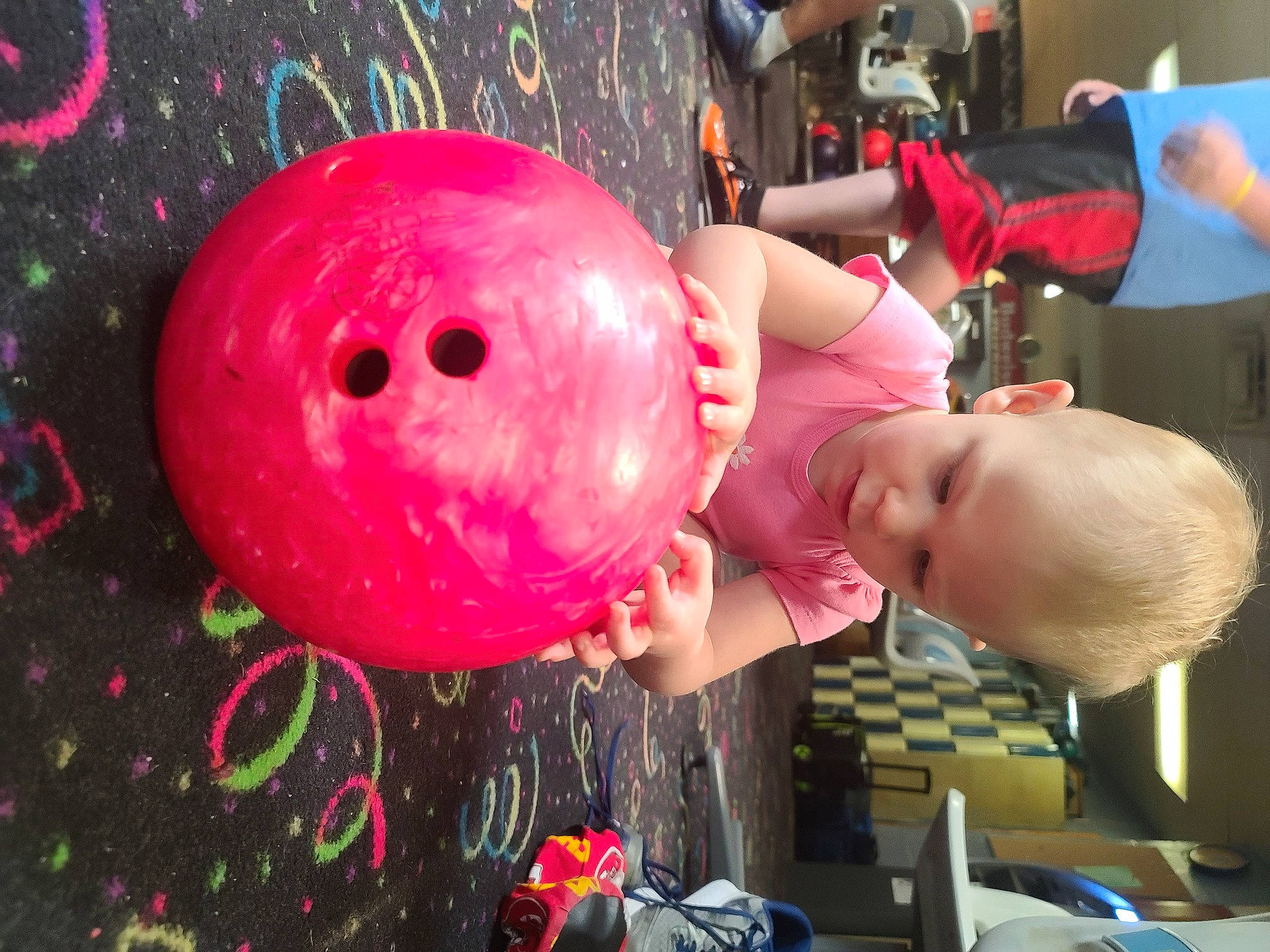 Gemma is registered to the contest to win money with this photo: baby, ball, balloon, bowling_ball, bowling_equipment, carmine, child, event, fun, happy, hat, leisure, party_supply, person, pink, plant, recreation, sports_equipment, toddler, toy