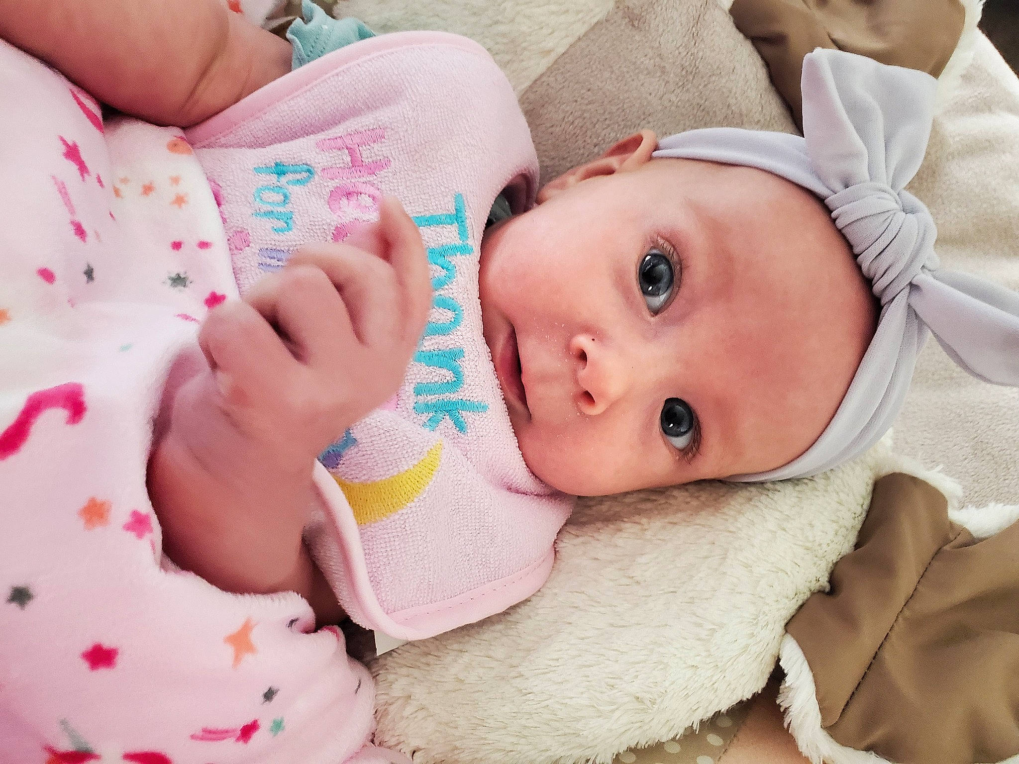 Melaina is registered to the contest to win money with this photo: baby, baby_sleeping, beauty, cheek, child, ear, eye, face, forehead, hand, head, headgear, headwear, lip, mouth, nose, person, pink, product, skin