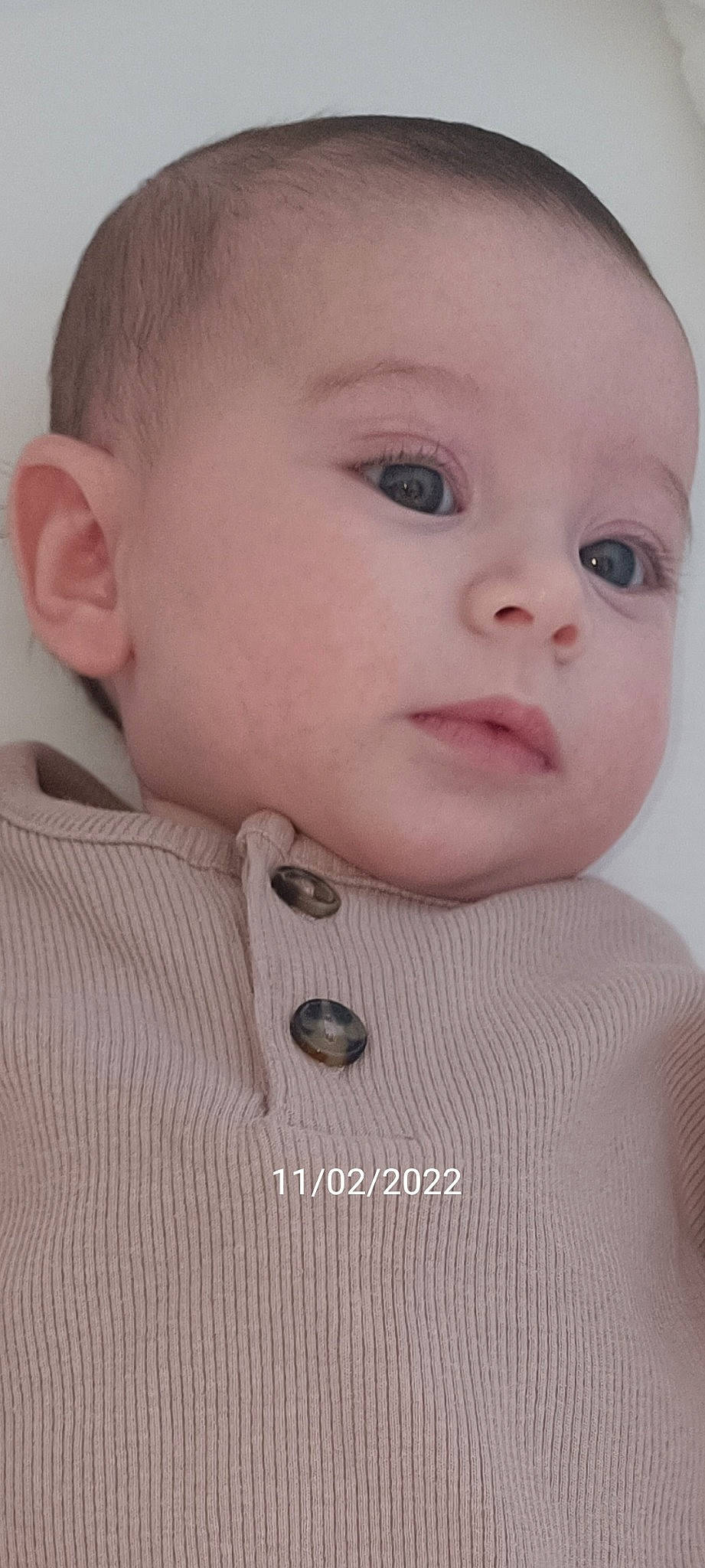 Ella participe au concours pour gagner de l'argent avec cette photo : baby, baby_toddler_clothing, button, cheek, child, chin, clothing, collar, dress_shirt, eyelash, iris, lip, neck, no_expression, nose, outerwear, pattern, person, skin, sleeve