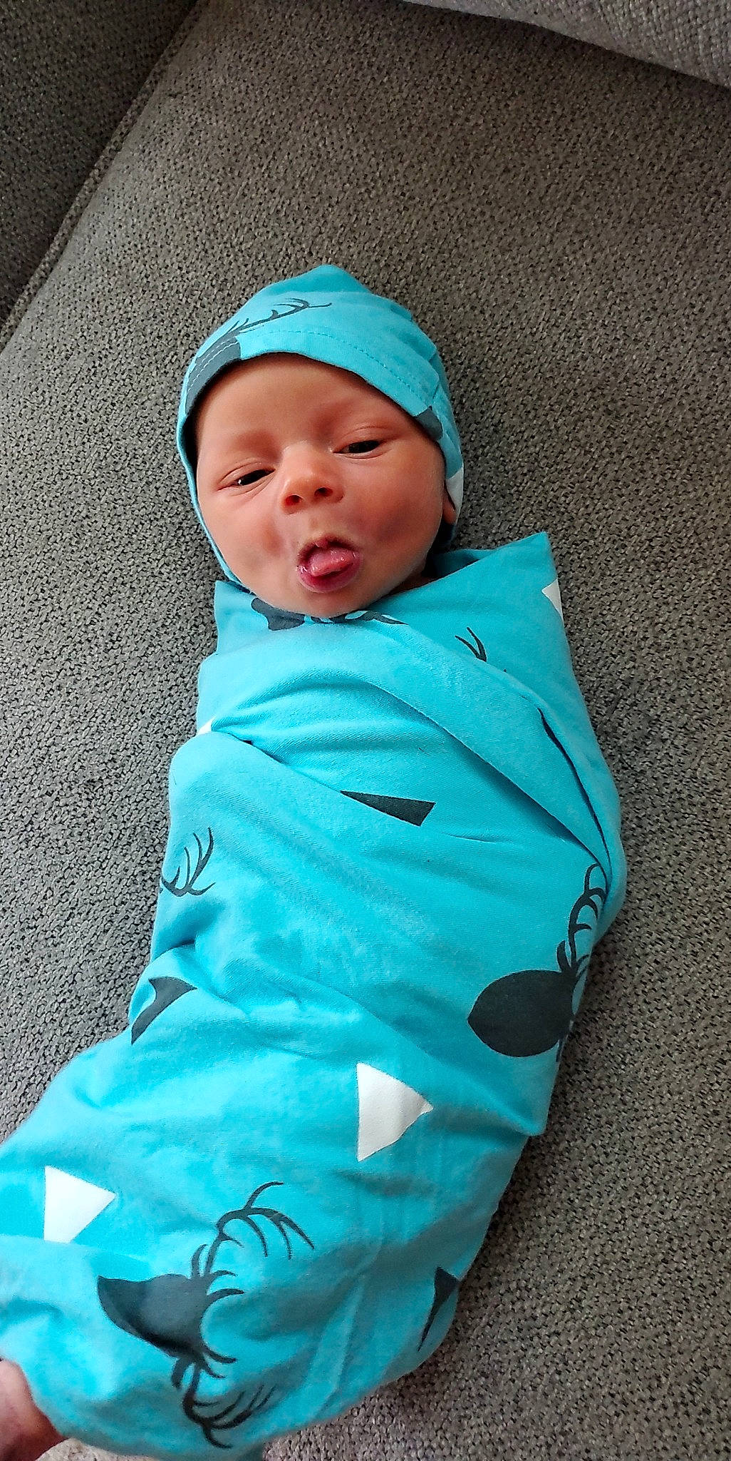 Beau joined the competition — help win amazing prizes! aqua, baby, baby_products, baby_toddler_clothing, blue, cap, cheek, child, comfort, electric_blue, eye, face, headwear, linens, magenta, outerwear, pattern, person, sleeve, t_shirt