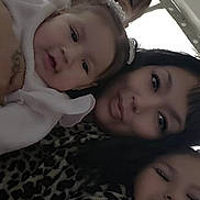 Avery Mae Zuniga joined the competition — help win amazing prizes! baby, child, family, smiling, indoor, window, person, portrait, closeup, hair, face, clothing, leopard_print, happy, toddler, sibling, woman, girl, cute, togetherness