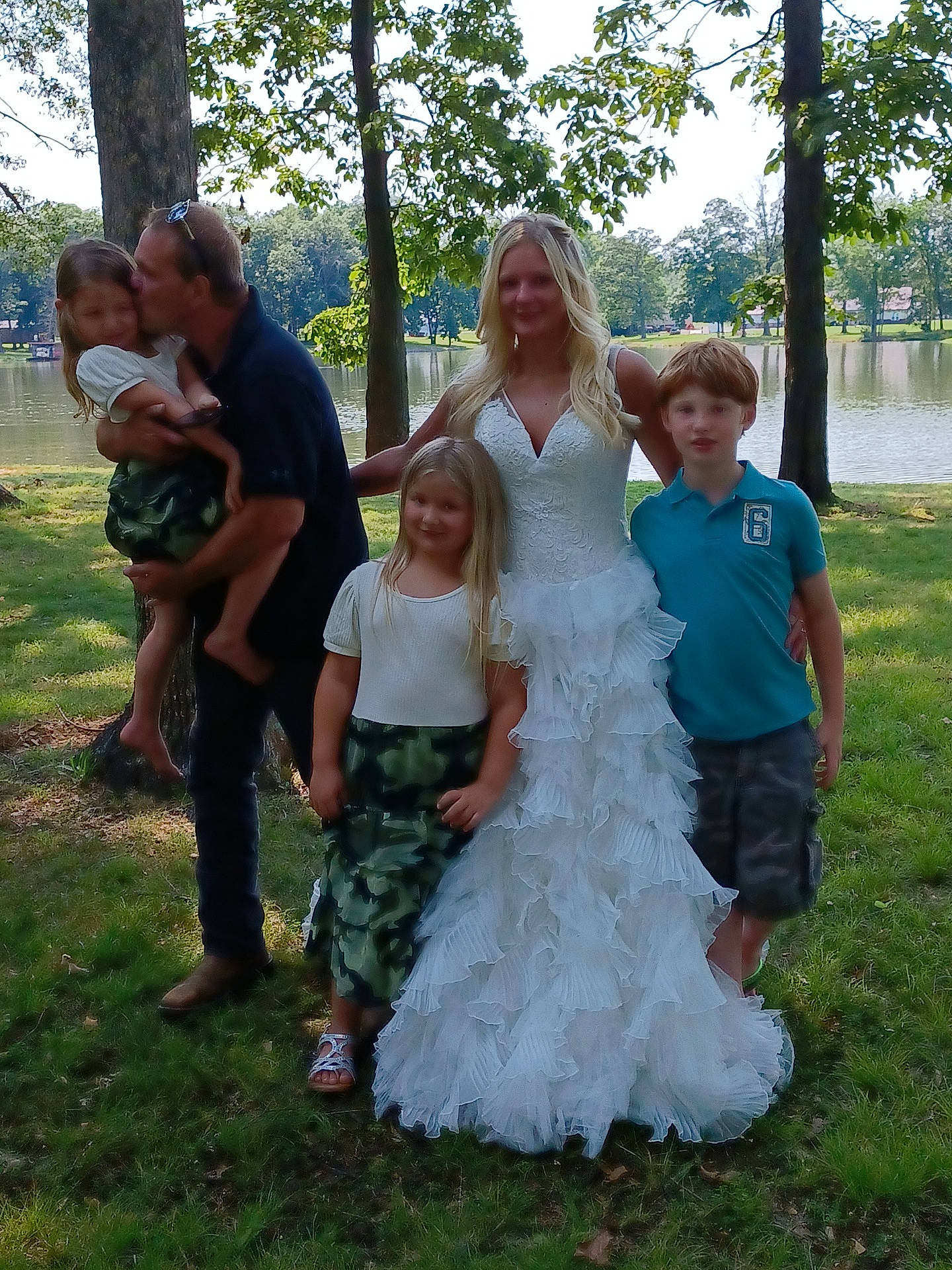 Eastyn joined the competition — help win amazing prizes! botany, bridal_clothing, bridal_party_dress, dress, face, facial_expression, fun, gesture, gown, hairstyle, happy, interaction, joy, natural_environment, people_in_nature, person, sky, smile, social_group, standing