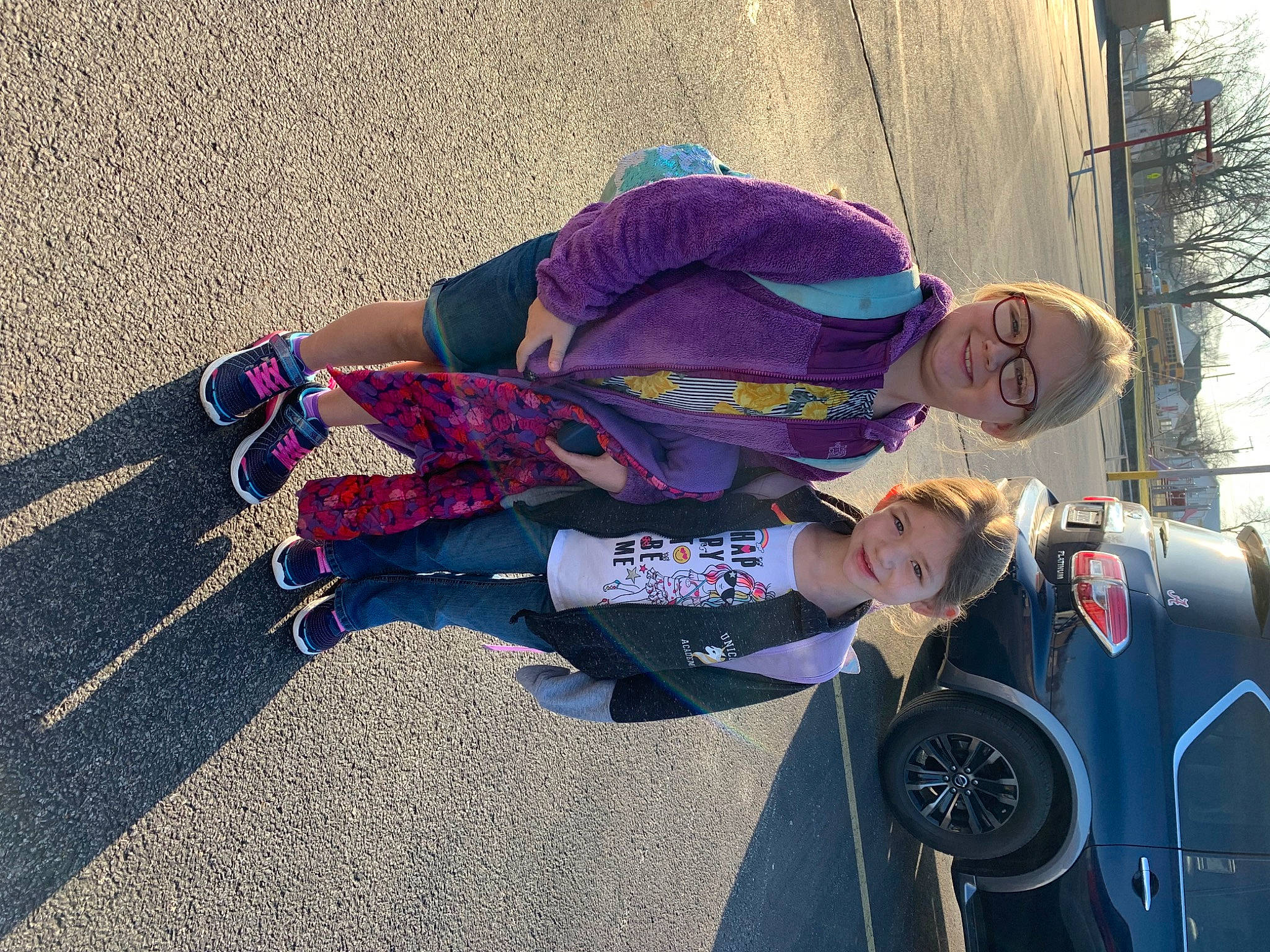 Marley Rose joined the competition — help win amazing prizes! asphalt, baby_products, child, electric_blue, eyewear, fun, hat, joy, motor_vehicle, pedestrian, person, recreation, road, road_surface, shadow, sky, smile, sneakers, street, toddler