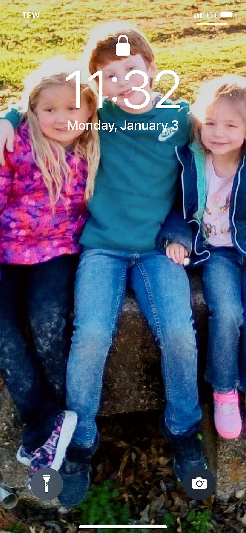 Marley Rose is registered to the contest to win money with this photo: clothing, cool, denim, eye, face, gesture, grass, hair, happy, head, jeans, joy, leg, person, pink, red, shoe, sleeve, smile, textile