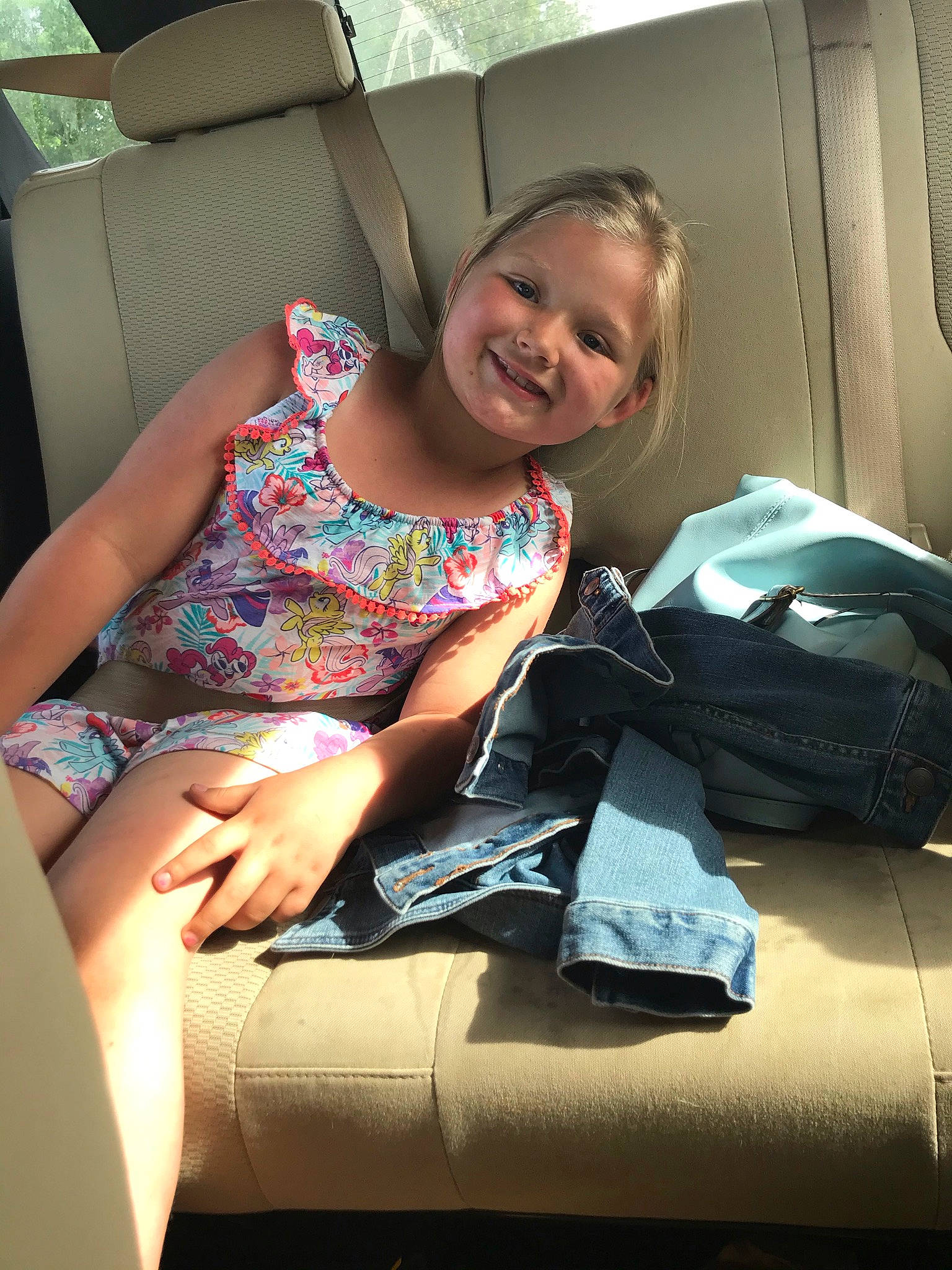 Paisley Rose joined the competition — help win amazing prizes! auto_part, automotive_design, car_seat, comfort, couch, elbow, foot, fun, happy, human_leg, joint, joy, knee, lap, leg, person, room, sitting, smile, textile