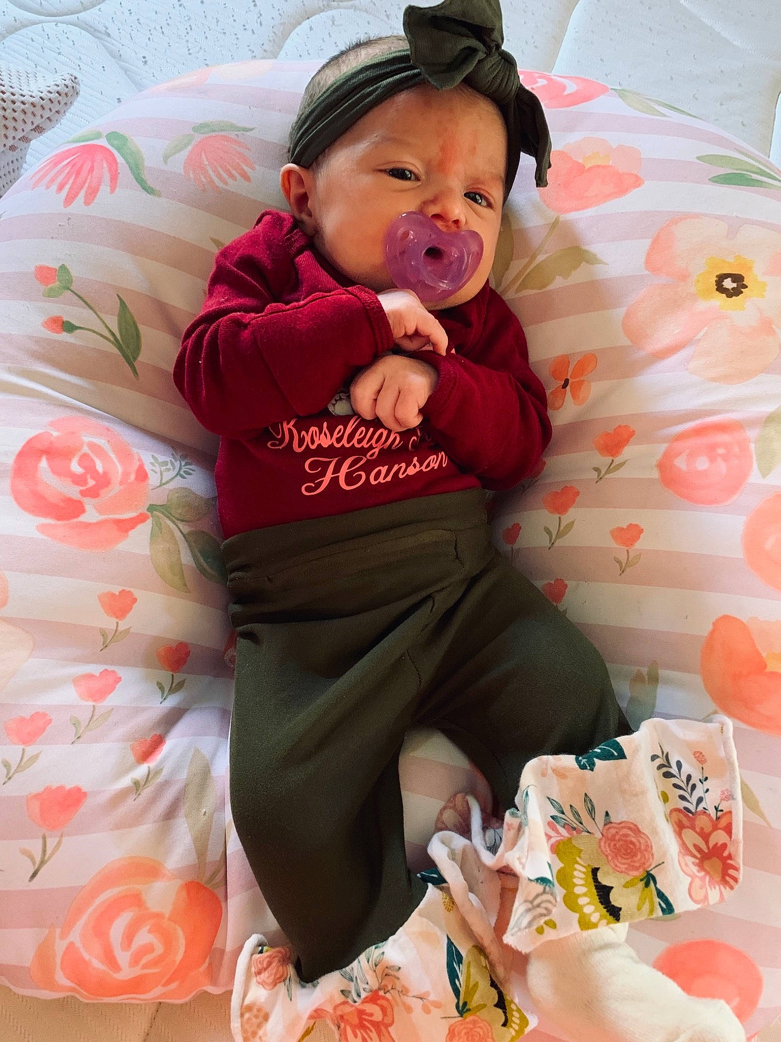 Roseleigh joined the competition — help win amazing prizes! baby_toddler_clothing, cap, child, comfort, eye, fun, happy, lap, leg, mammal, person, pink, product, sleeve, smile, sock, t_shirt, textile, thigh, toddler