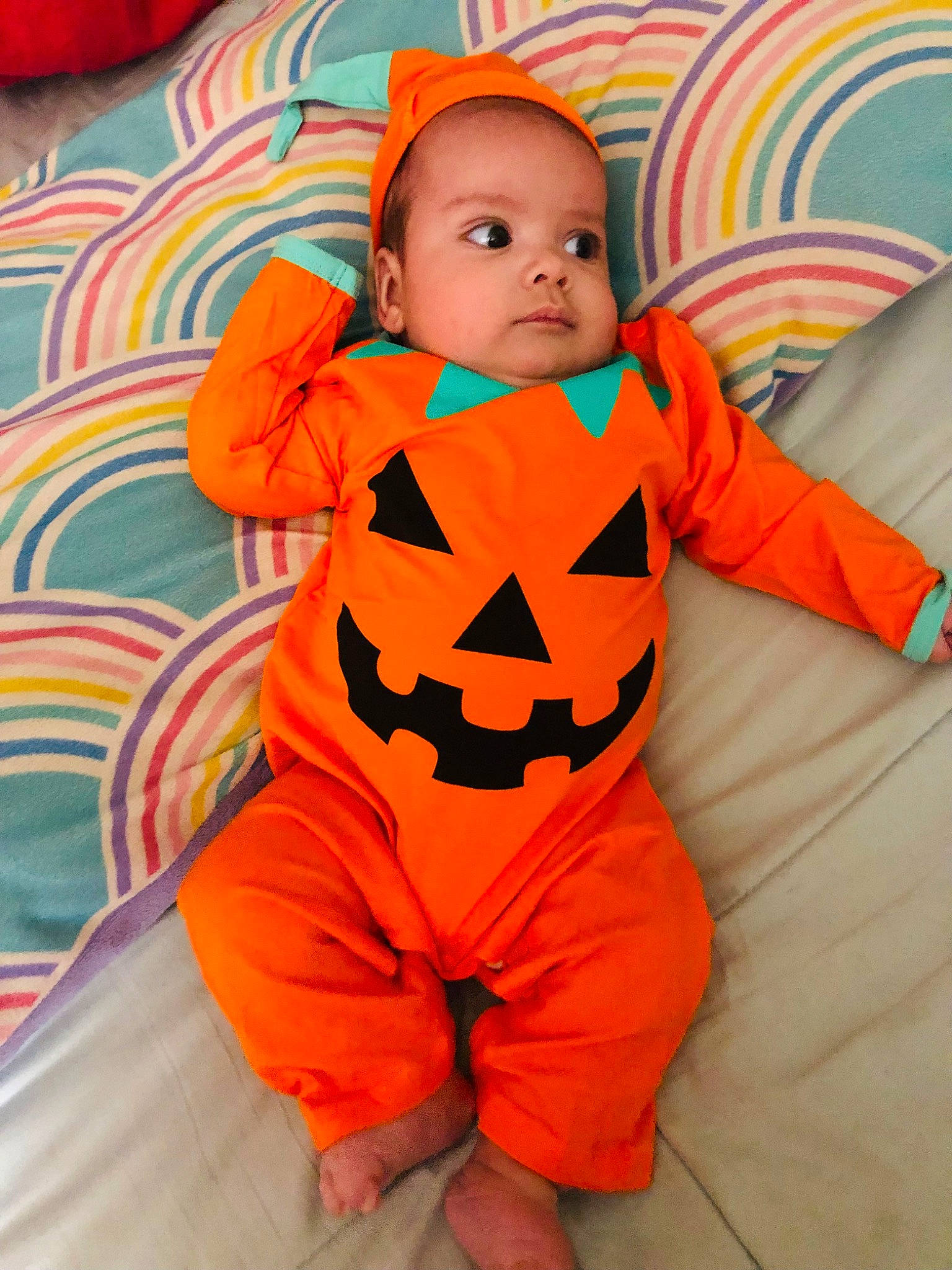 Stephen joined the competition — help win amazing prizes! baby, baby_toddler_clothing, calabaza, child, comfort, costume, face, flooring, fun, happy, head, linens, orange, outerwear, pattern, person, pumpkin, sitting, sleeve, textile