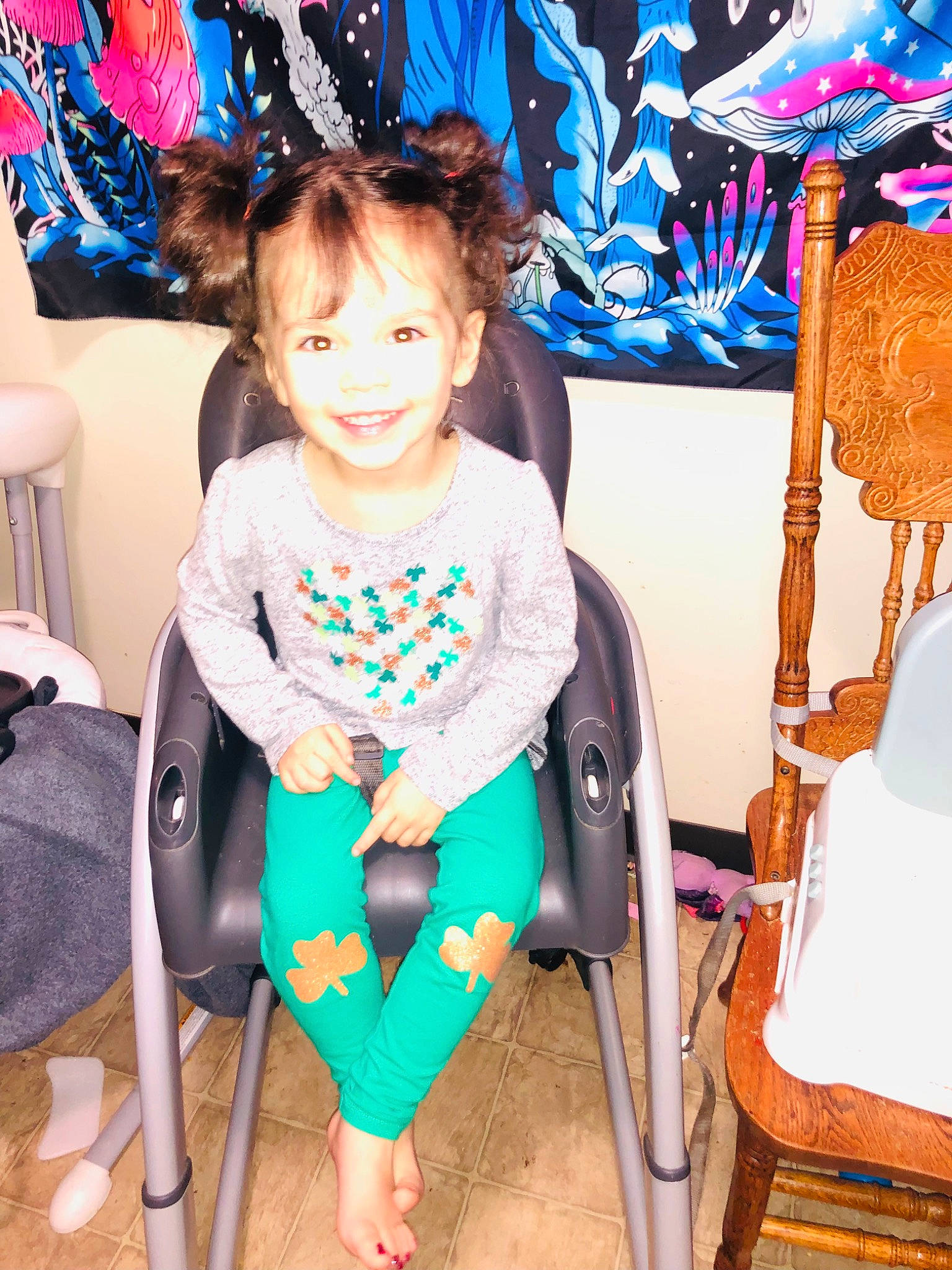 Ava is registered to the contest to win money with this photo: baby_toddler_clothing, bag, blue, chair, child, electric_blue, event, fashion_accessory, fashion_design, fun, happy, joy, leisure, magenta, pattern, person, room, sitting, smile, toddler